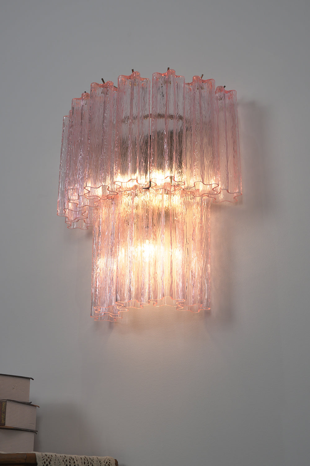 Cascading Prism Pink Glass Wall Light | Glass, Metal | Angled profile showing the tiered layers and translucency of the pink glass | Samu Lamp Cascading Prism