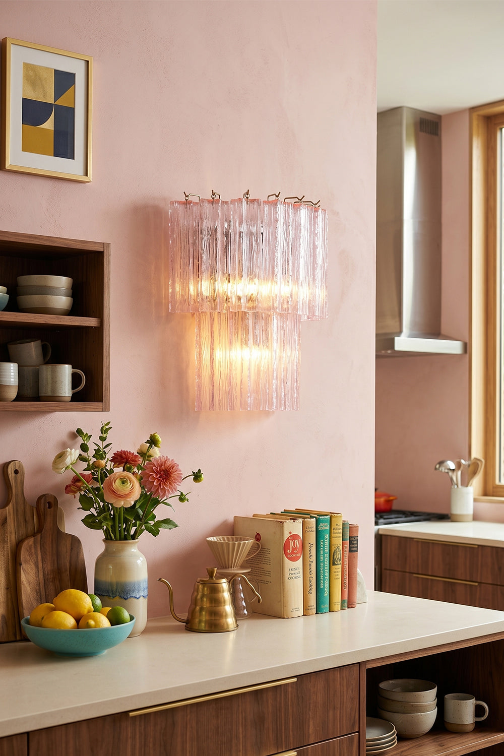 Cascading Prism Pink Glass Wall Light | Glass, Metal | Set against a pink accent wall in a stylish kitchen corner with rustic decor | Samu Lamp Cascading Prism