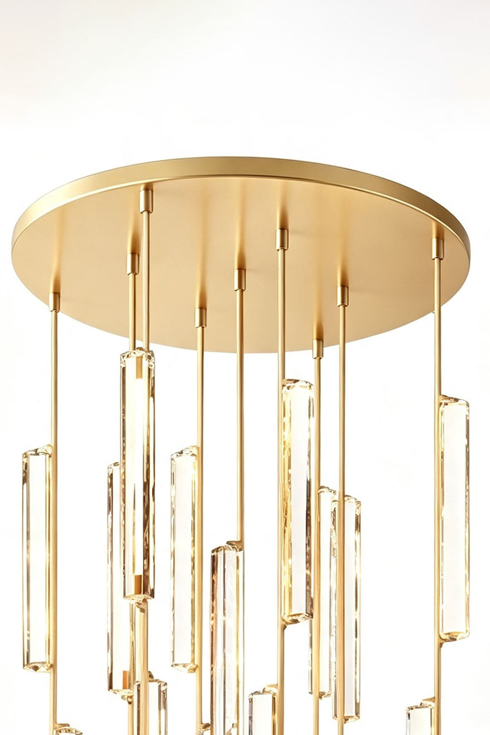 Cassian Cascading Crystal Ring Chandelier with vertical brass-toned drops and crystal prisms.