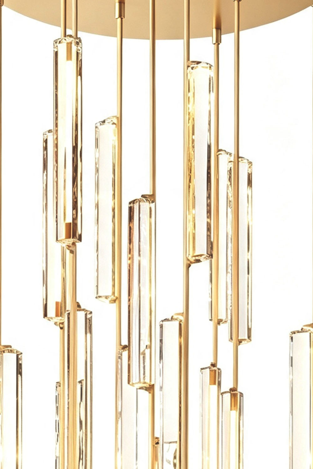 Cassian Cascading Crystal Ring Chandelier features elegant K9 crystal prisms and brass-toned drops for a stunning light display.