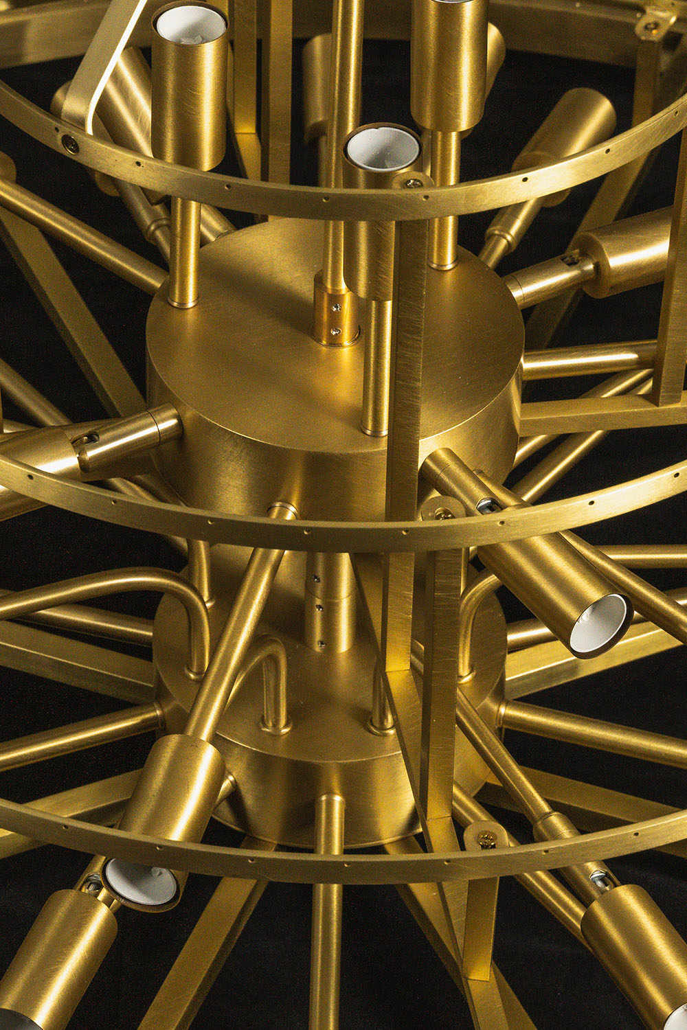 Cassian Tiered Prism Ring Chandelier | Clear Prism Glass and Brass | Bare brass skeleton frame showing tiered rings and light sockets | Samu Lamp