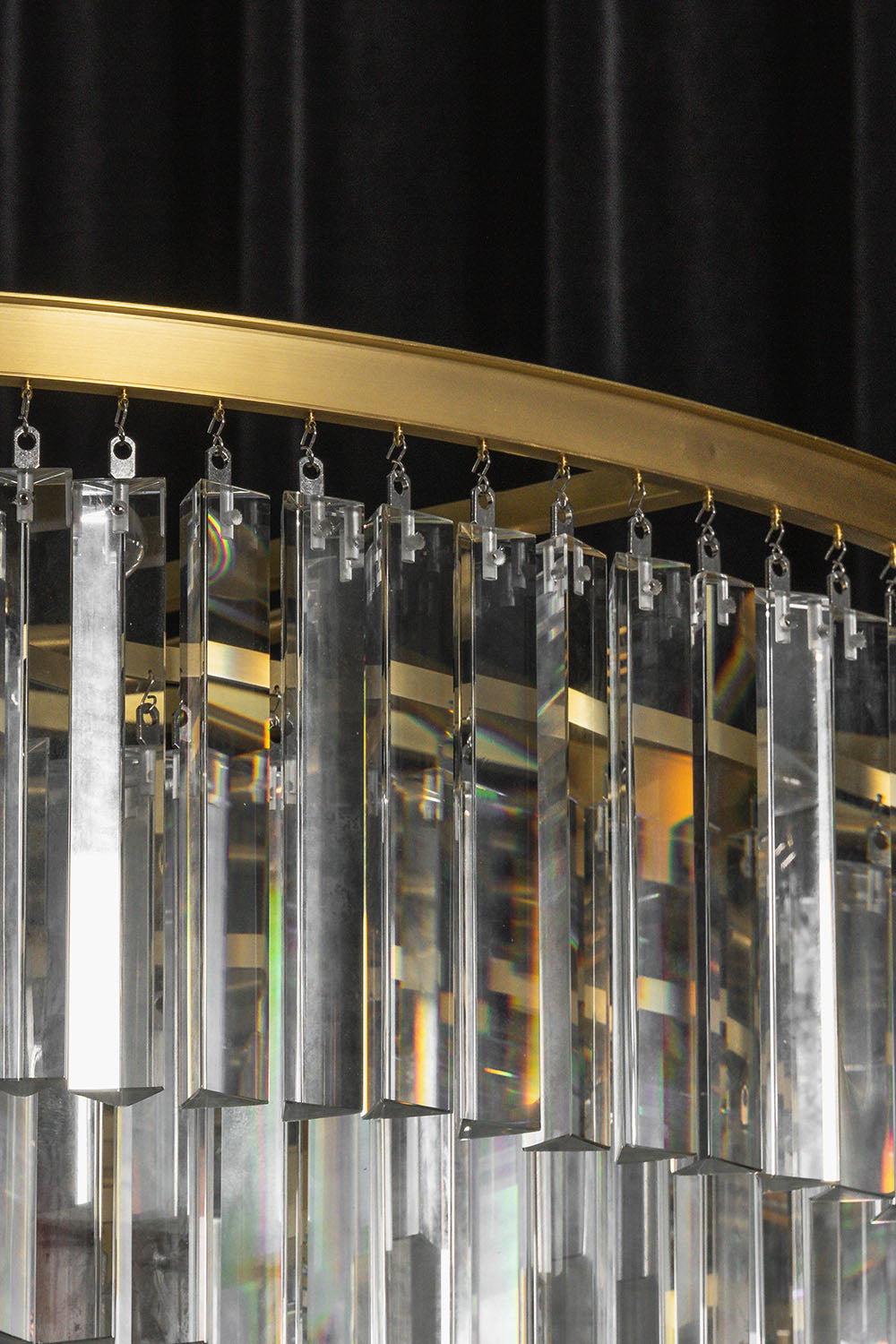 Cassian Tiered Prism Ring Chandelier | Clear Prism Glass and Brass | Side angle detail showcasing cascading layers of clear glass rods | Samu Lamp