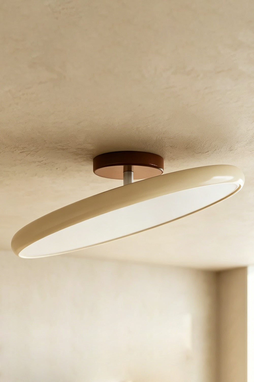 Celestial Disc Lacquered Ceiling Light | Acrylic, Metal | Angled side-profile view of the unlit green-trimmed light on a grey wall, showing depth | Detail shot | Samu LampCelestial Disc