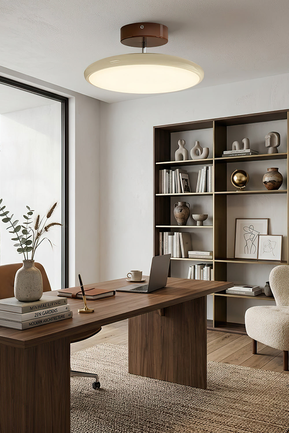 Celestial Disc Lacquered Ceiling Light | Acrylic, Metal | Green lacquered trim variant installed and illuminated over a wooden dining set in a room with patterned walls and abstract art | Samu LampCelestial Disc