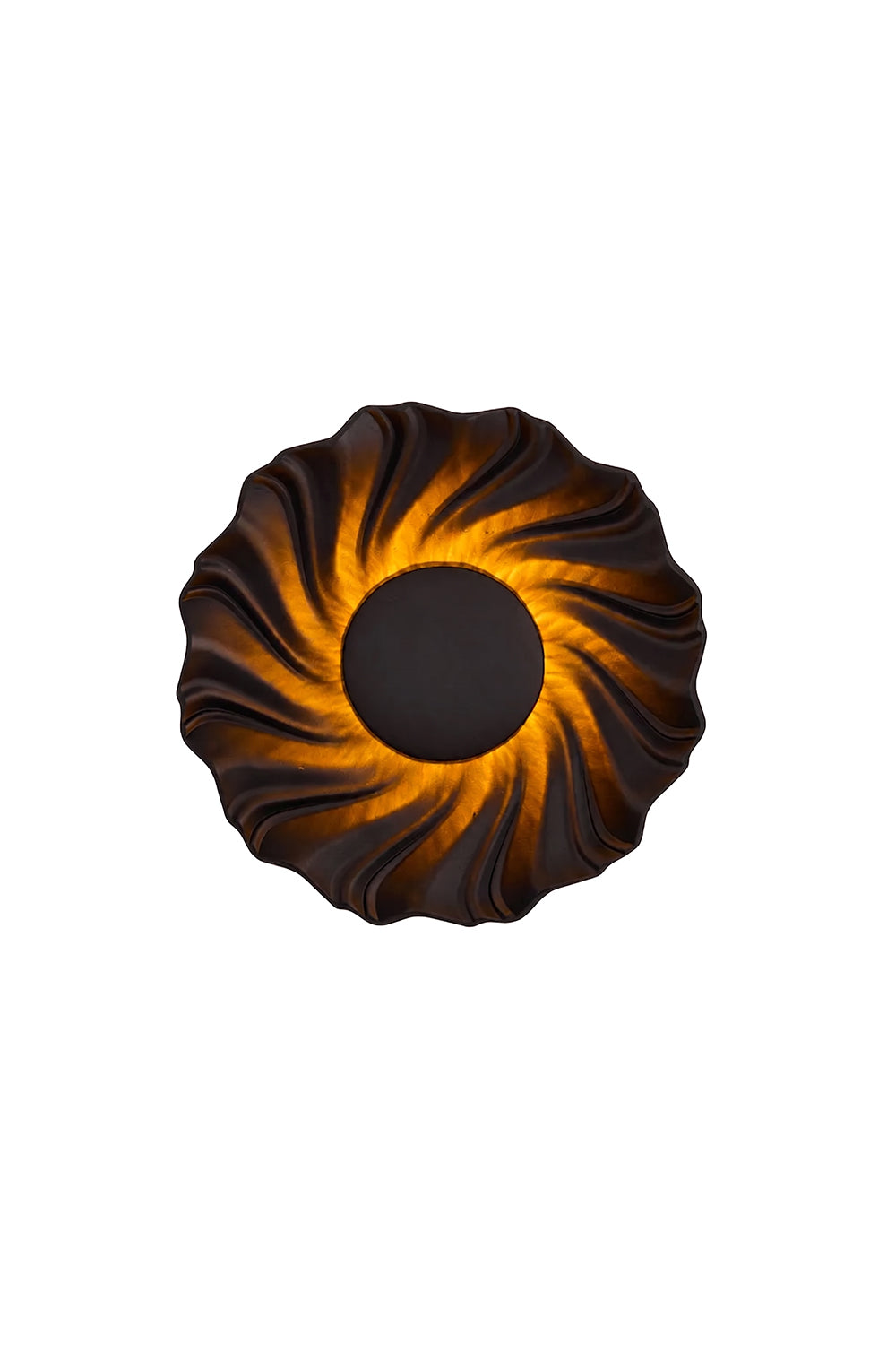 Centripetal Solstice Metal Wall Lamp | Metal, Resin | Black with intricate wood-grain concentric ripple texture and warm indirect backlighting | Isolated lit product shot on white background | Samu Lamp