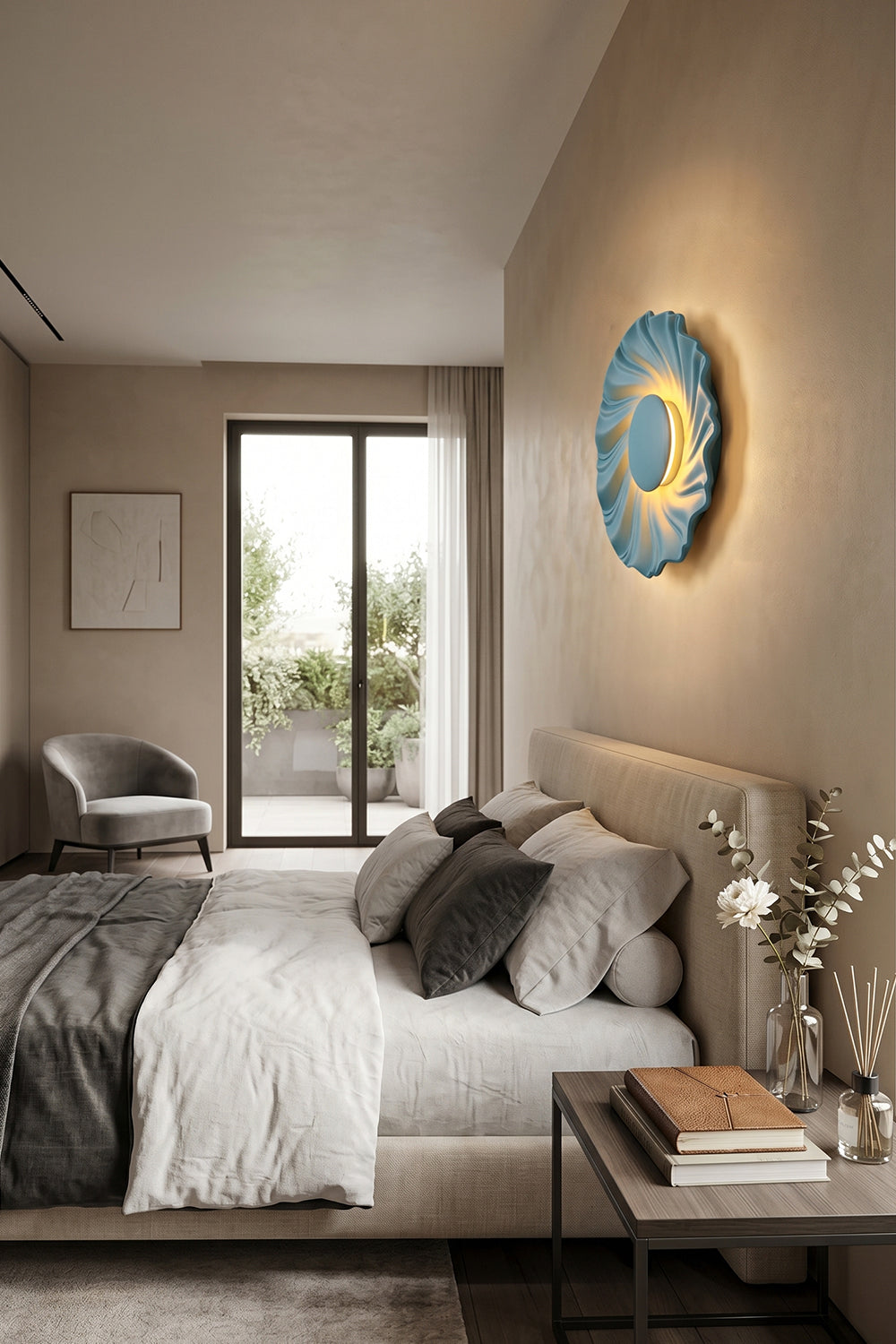 Centripetal Solstice Metal Wall Lamp | Metal, Resin | Blue textured lamp positioned as a bedside accent light in a minimalist modern bedroom with grey bedding and natural wood flooring | Samu Lamp