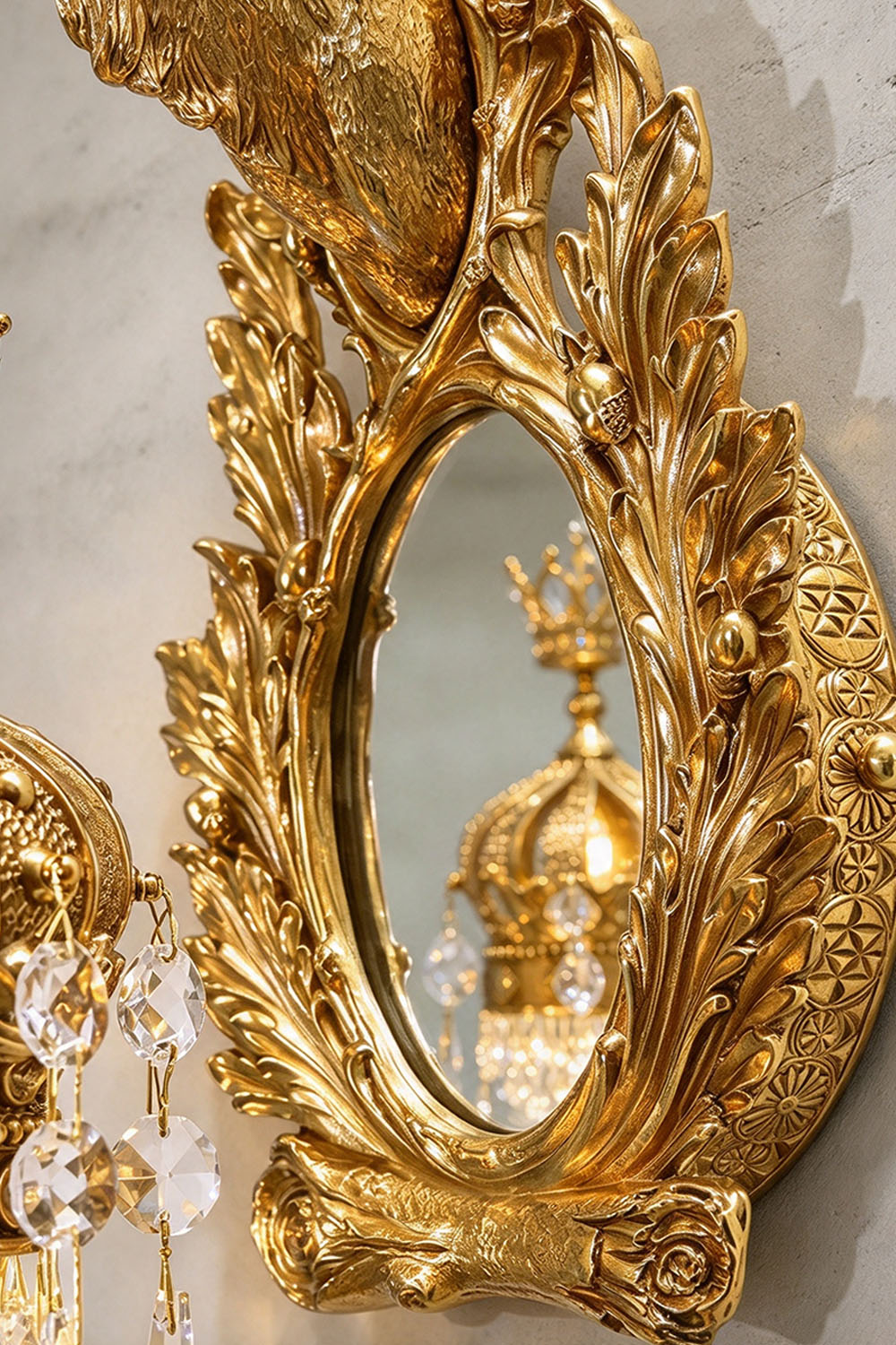 Cerfaline Brass Stag Head K9 Crystal Wall Sconce | Brass and Crystal | Detail of ornate carved mirror frame | Samu Lamp