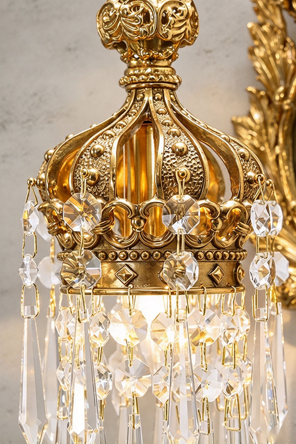Cerfaline Brass Stag Head K9 Crystal Wall Sconce | Brass and Crystal | Close-up of crown shade and cut crystals | Samu Lamp