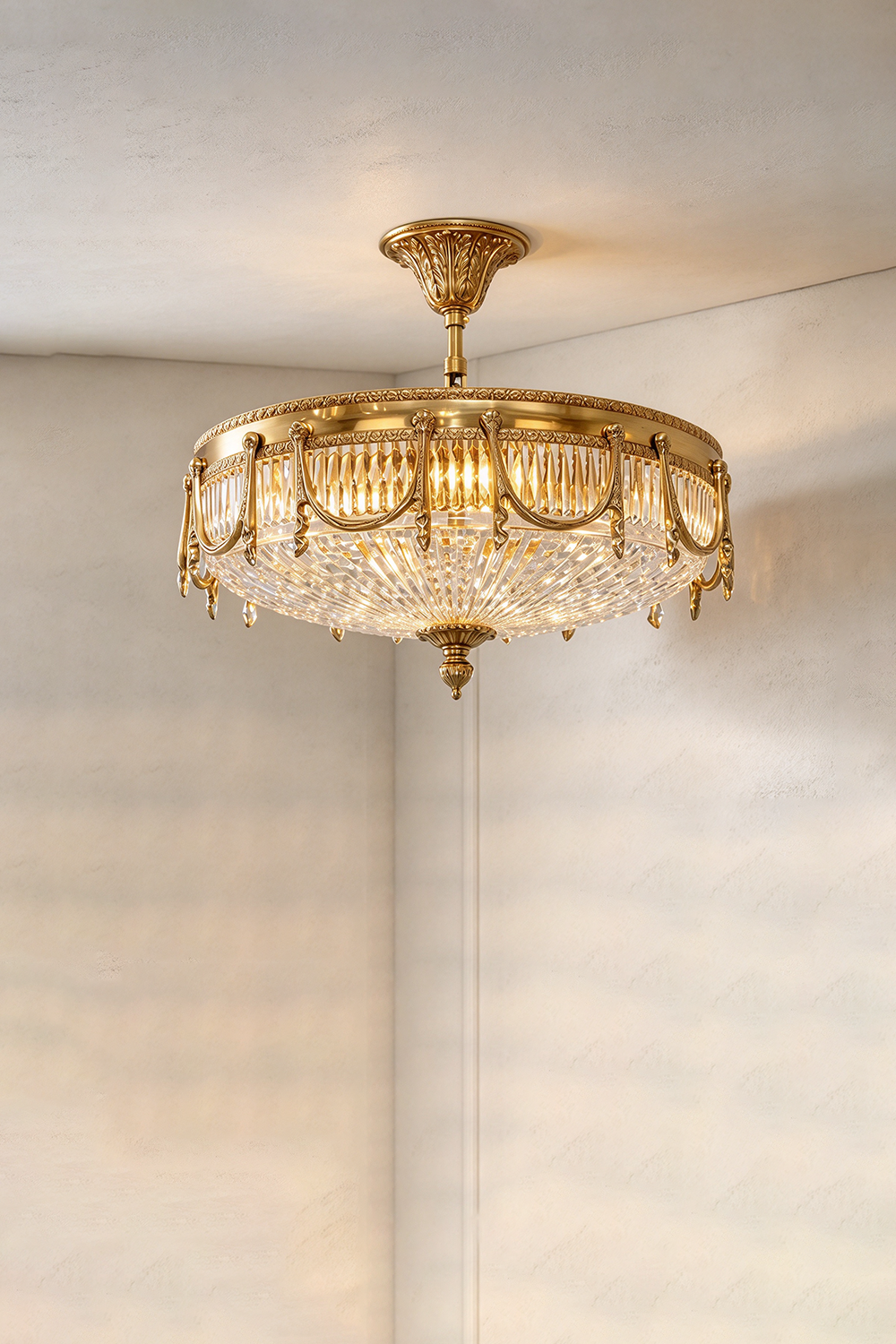 Chaumelle Brass Swag Ribbed Glass Ceiling Light | Ribbed Glass and Brass | Semi-flush mount variant displayed in a plain room corner glowing softly | Samu Lamp