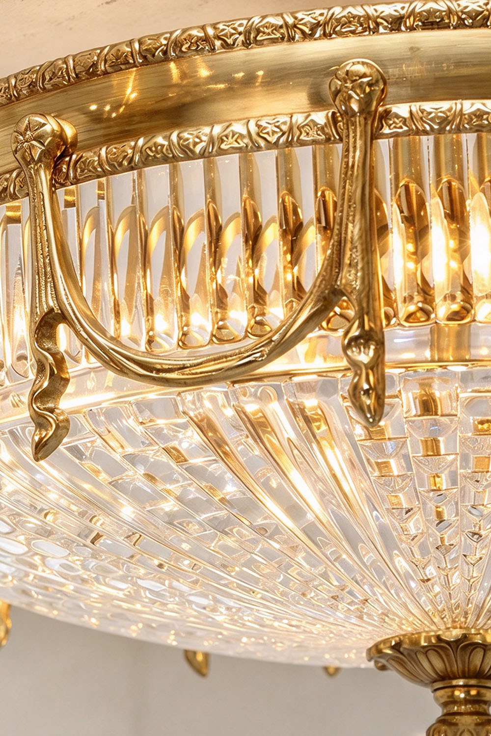 Chaumelle Brass Swag Ribbed Glass Ceiling Light | Ribbed Glass and Brass | Close-up view highlighting the brass swag garland detailing on the rim | Samu Lamp