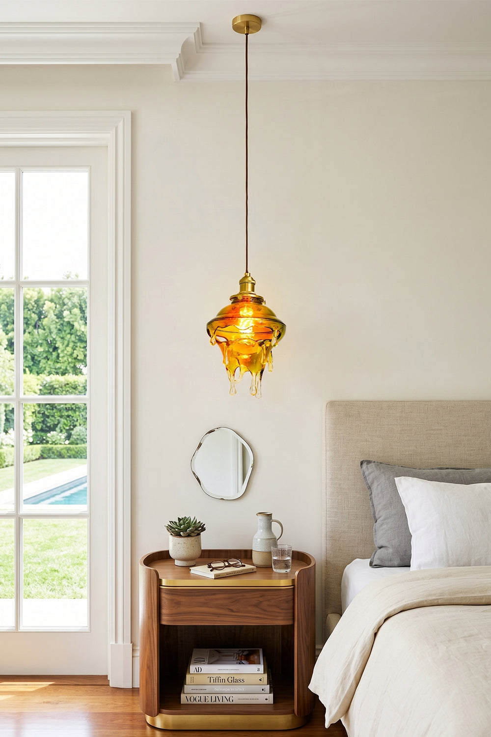 Chroma Drip Rainbow Resin Pendant Lamp | Resin, Metal | Suspended as a unique bedside pendant light over a wooden nightstand in a calm, modern neutral bedroom | Samu Lamp