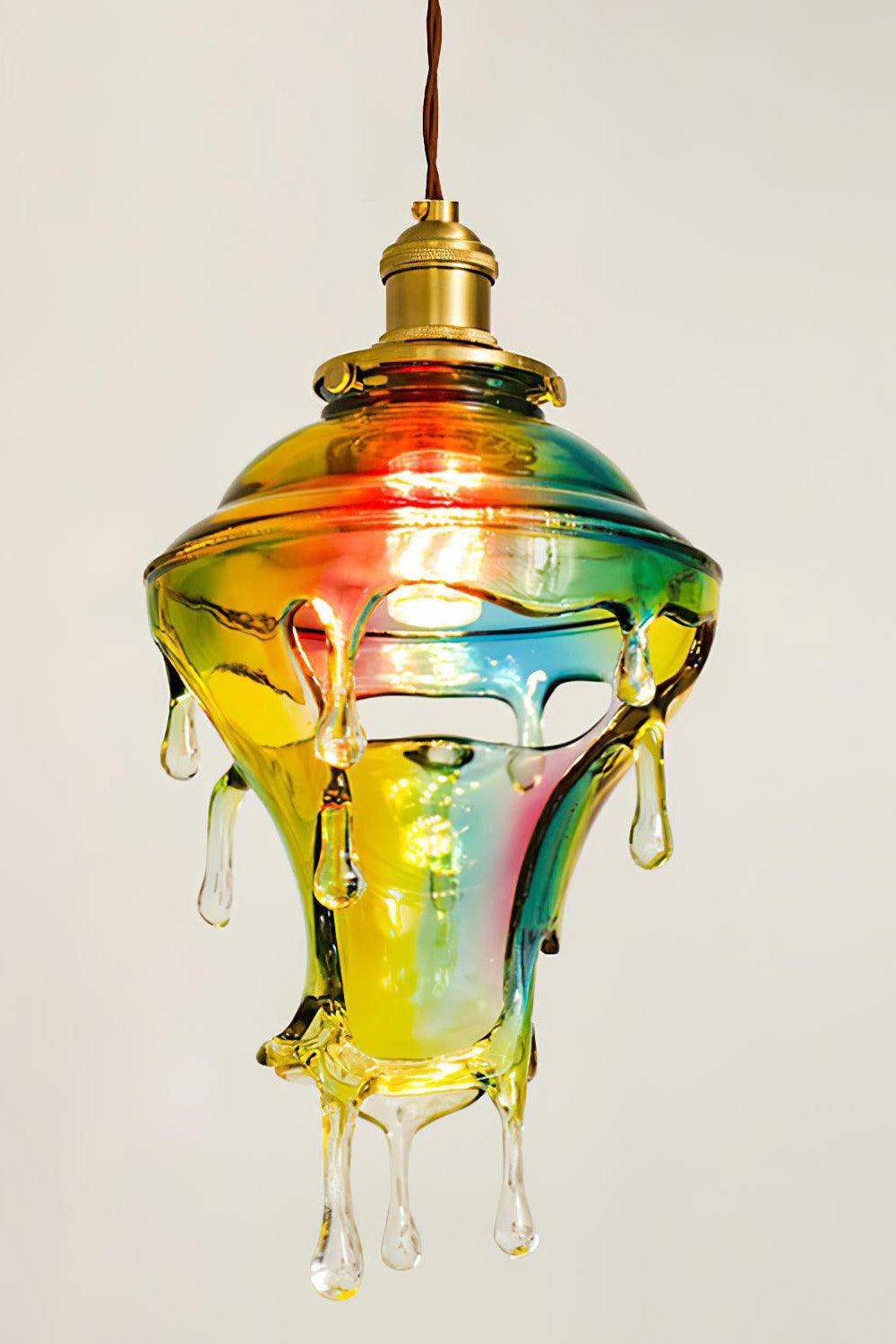 Chroma Drip Rainbow Resin Pendant Lamp | Resin, Metal | Detailed studio shot of the fully illuminated rainbow gradient shade displaying clear hanging droplet prisms | Detail shot | Samu Lamp