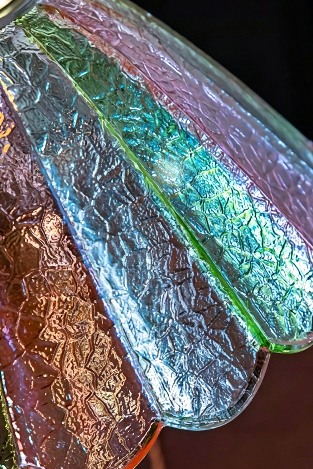 Clara Vintage Pastel Glass Table Lamp | Glass, Metal | Macro view of the iridescent clear, pink, and green striped textured glass panels of the shade | Detail shot | Samu Lamp