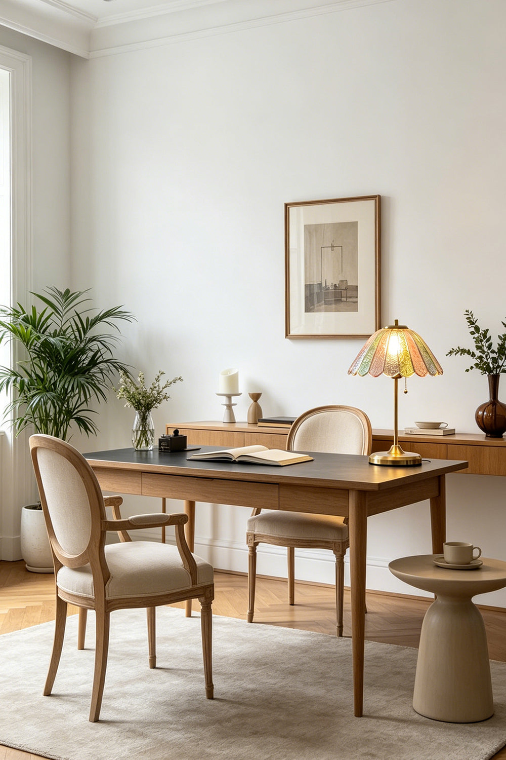 Clara Vintage Pastel Glass Table Lamp | Glass, Metal | Illumination on a minimalist wooden writing desk next to green indoor potted plants | Samu Lamp