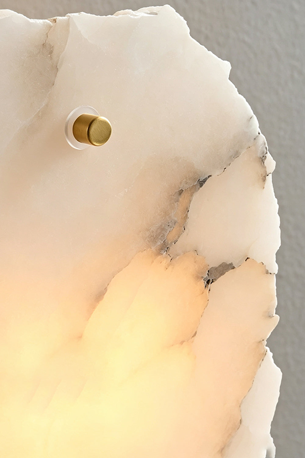 Corin Alabaster Wall Sconce showing natural alabaster texture and brass-finished metal detail.