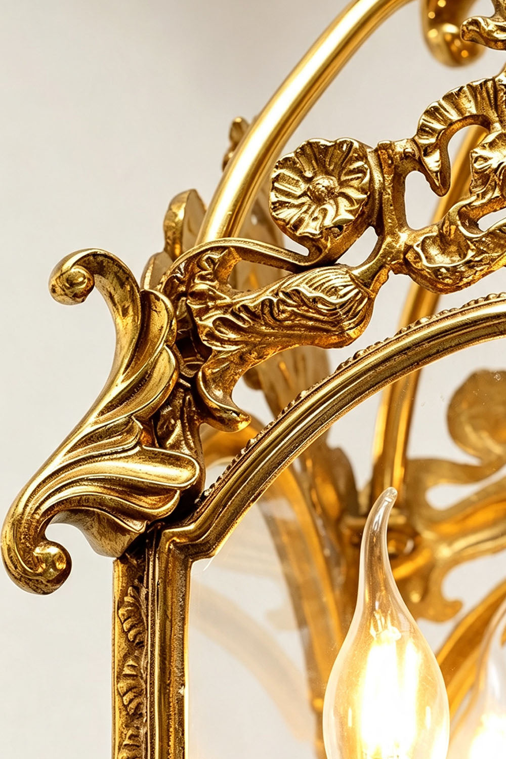 Close-up of intricate design on Corwin Glazed Brass Pendant Light highlighting ornate brass details.