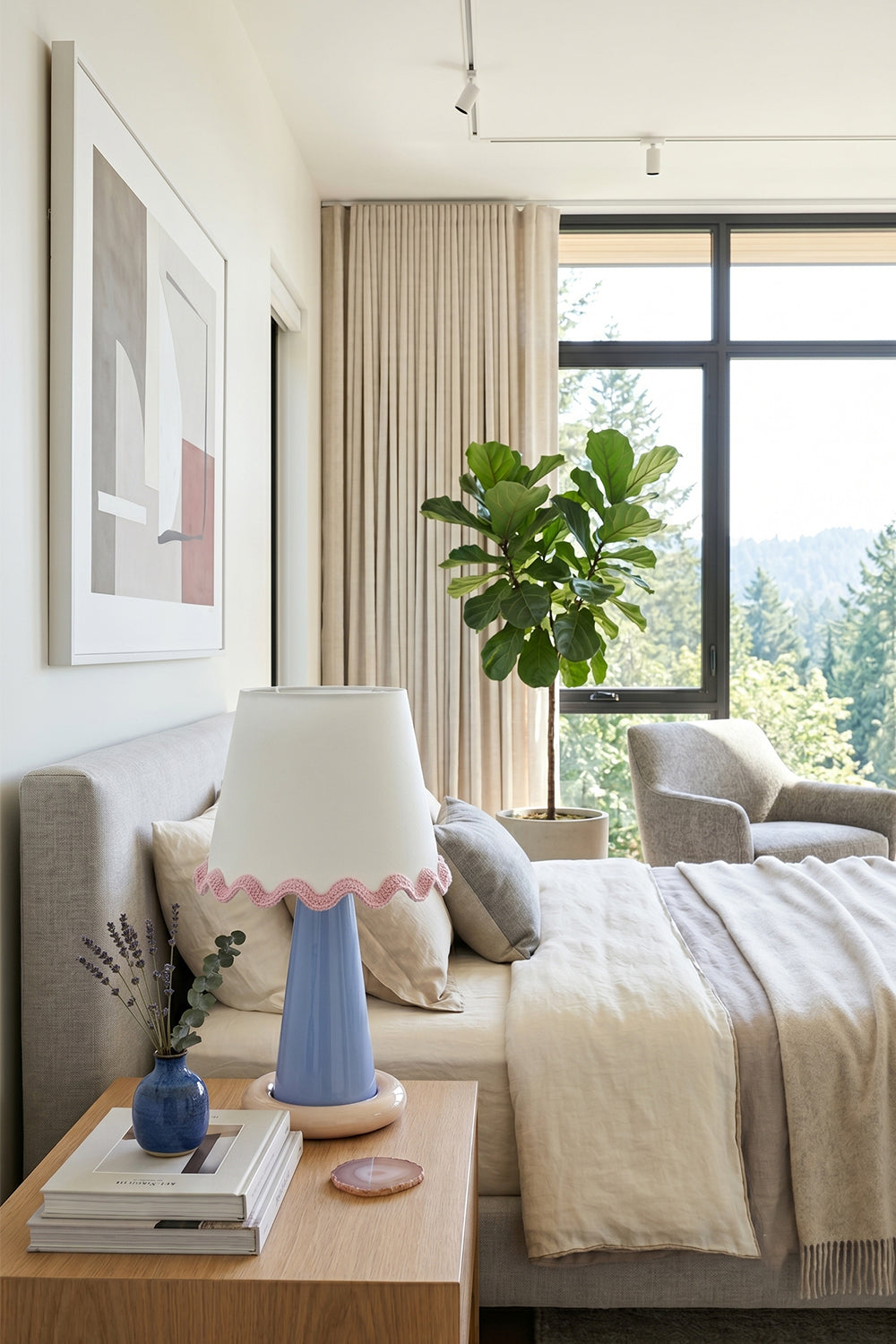 Dolce Ribbon Ceramic Table Lamp | Ceramic, Fabric | Set as a charming nightlight on a wooden nightstand next to a contemporary bed with neutral bedding layouts | Samu Lamp