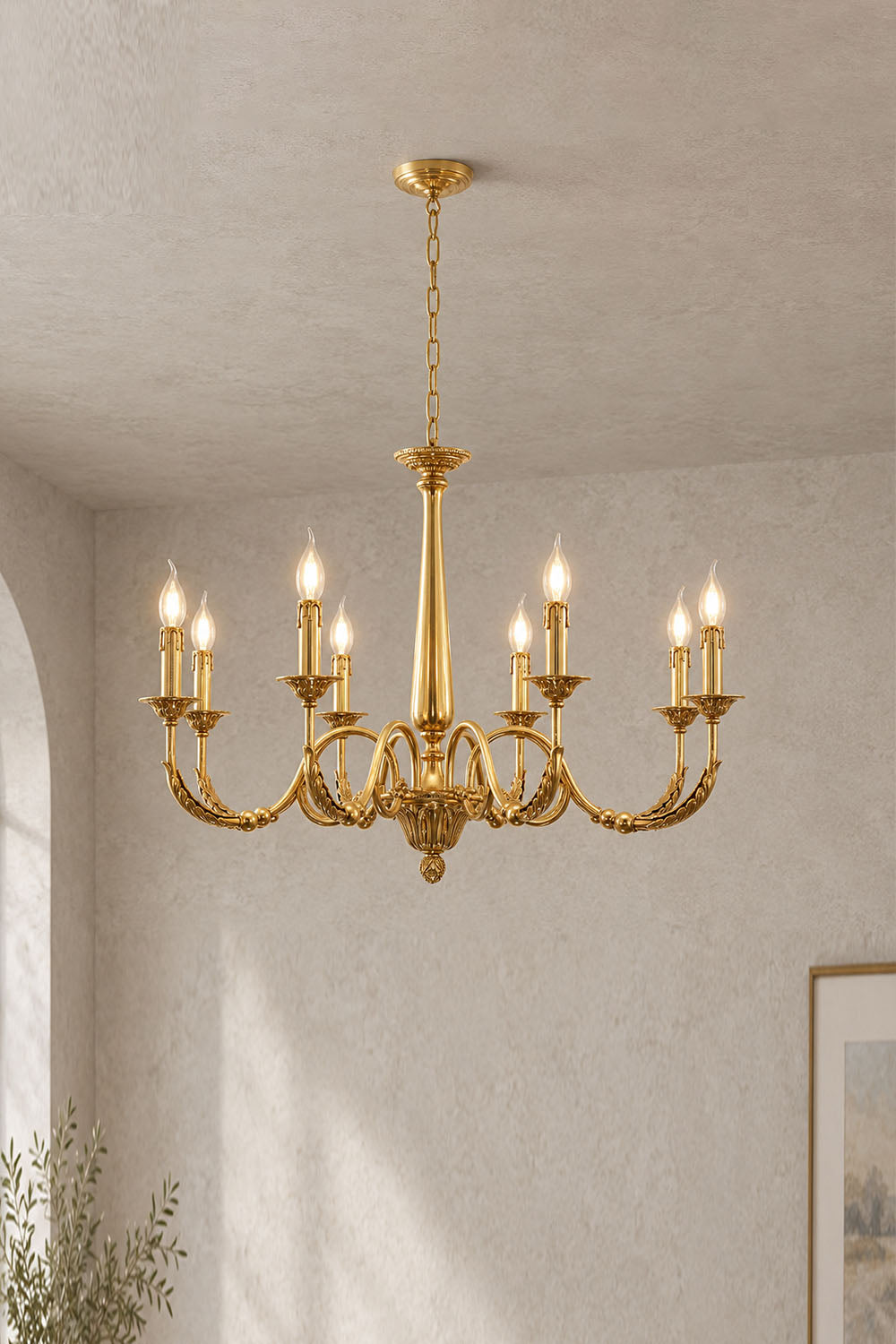 Dorvanne Brass Scroll Arm Candle Chandelier | Solid Brass | 10-light variant displayed on a plain wall | Samu Lamp