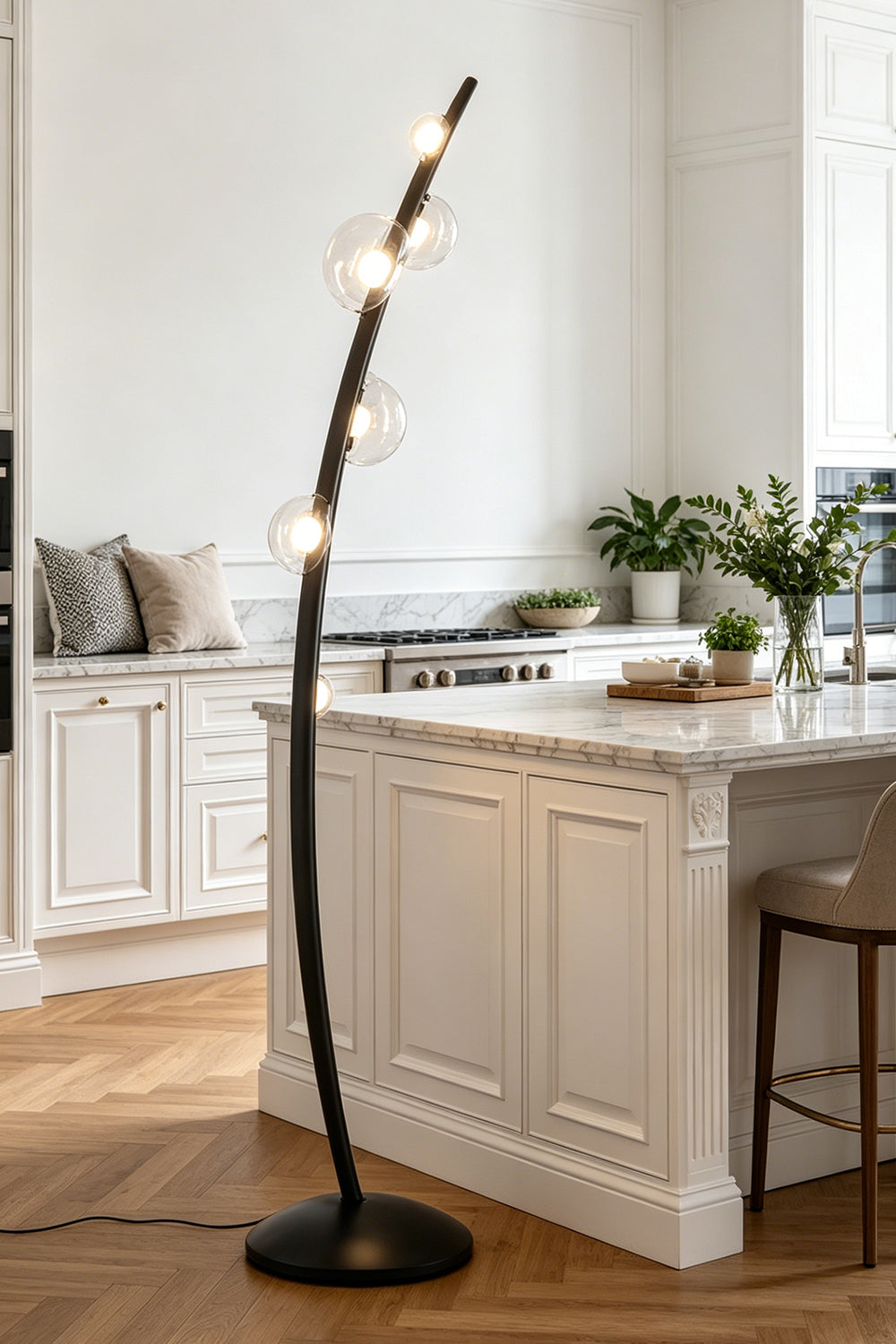 Drosia Dewdrop Floor Lamp | Glass, Metal | Positioned as an artistic decorative fixture in a modern bright kitchen next to a pristine white marble island counter | Samu Lamp
