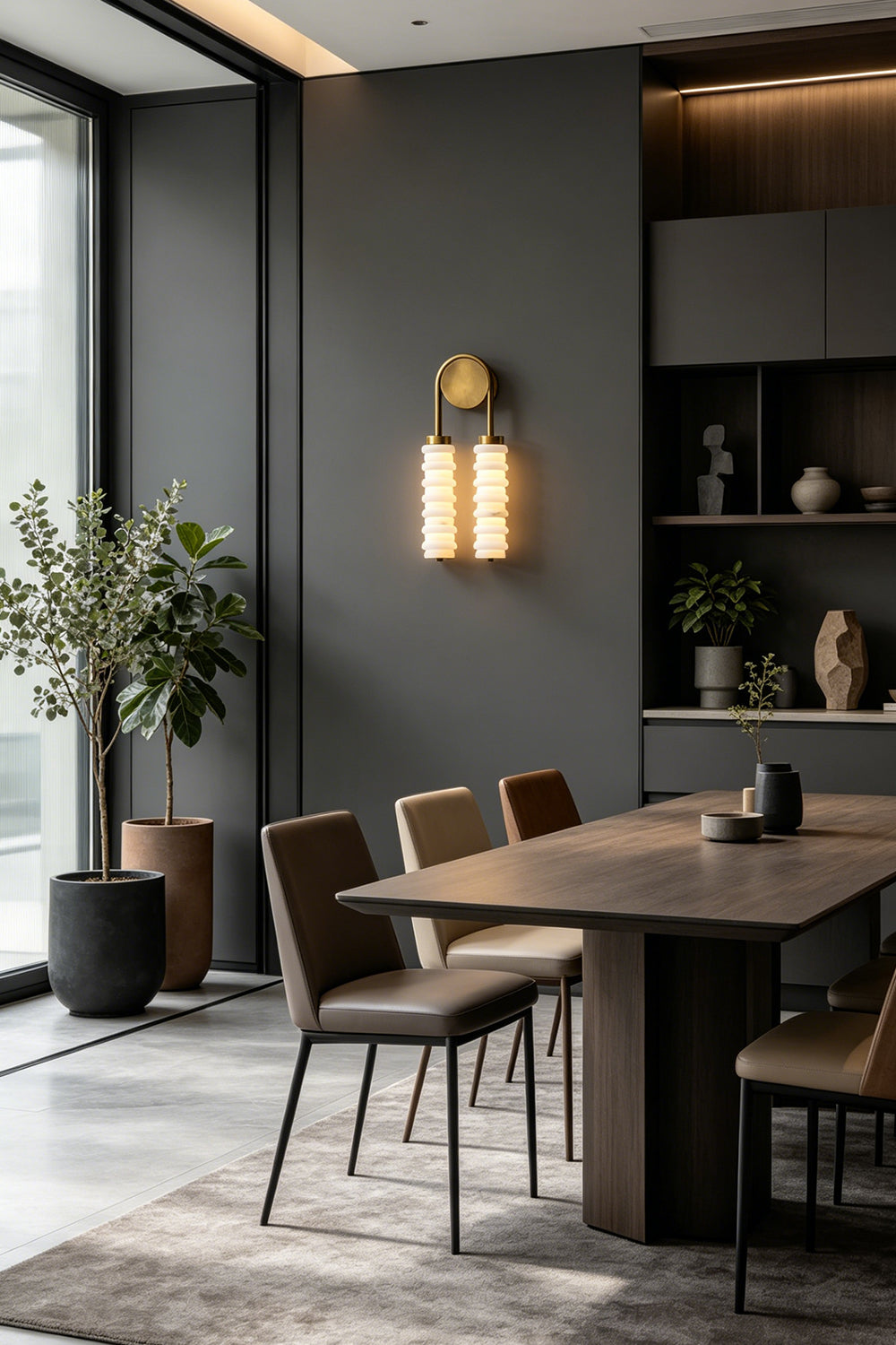 Dual Strata Alabaster Wall Lamp | Metal, Alabaster | Lit lamp providing elegant accent lighting in a sophisticated contemporary dining room | Samu Lamp