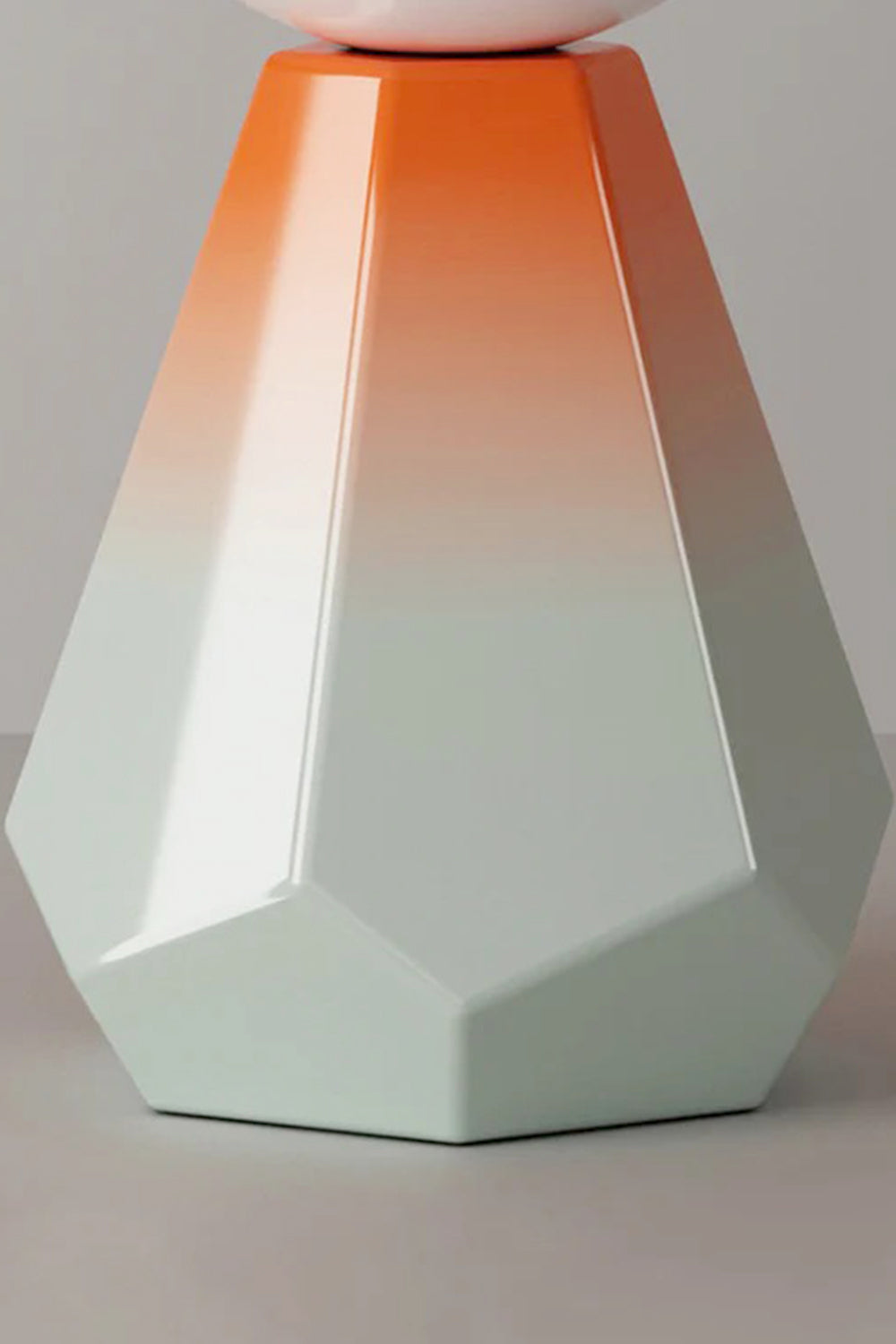 Duskora Retro Mushroom Table Lamp | Ceramic, Glass | Macro structural view focusing on the multi-faceted geometric base displaying its smooth mint green to orange gradient | Detail shot | Samu Lamp