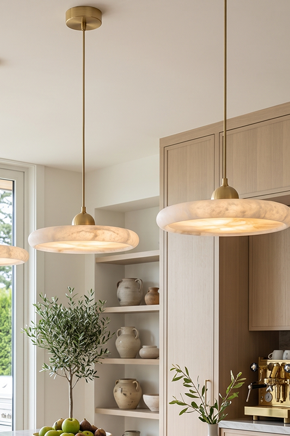 Elowen Alabaster Disc Pendant Light| Natural Alabaster and Brass | Multiple pendants lined up nicely to provide perfect illumination over a modern home kitchen bar area | Samu Lamp