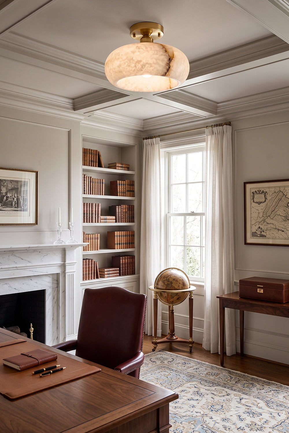 Elowen Alabaster Semi-Flush Ceiling Light illuminating a stylish office with warm tones and elegant decor.