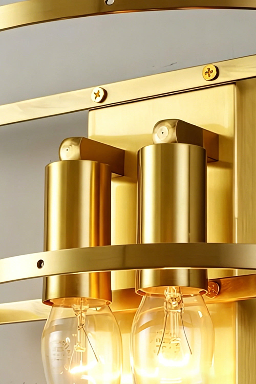 Elowen Cascading Glass Wall Lamp | Glass, Metal | Close-up focus on the internal polished gold brass mount frame structure and dual light bulb sockets | Detail shot | Samu Lamp