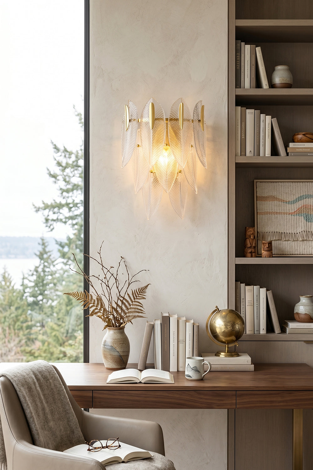 Elowen Cascading Glass Wall Lamp | Glass, Metal | Illuminating a minimalist contemporary study room, mounted above a wooden executive writing desk next to a bookcase | Samu Lamp