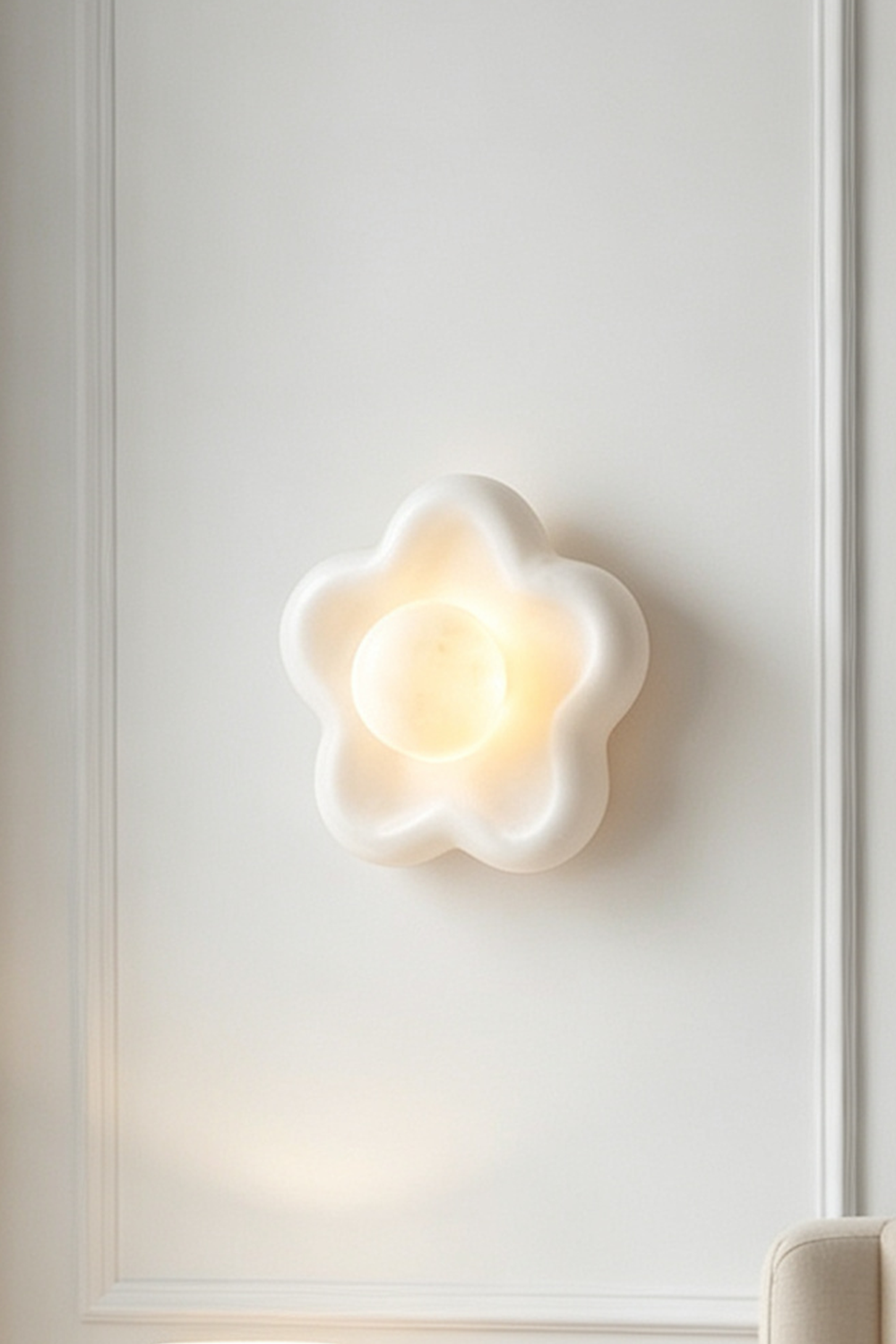 Elowen Petal Alabaster Wall Sconce | Natural Alabaster | Full front view of the wall lamp fully lit and glowing warmly against a clean neutral background | Samu Lamp