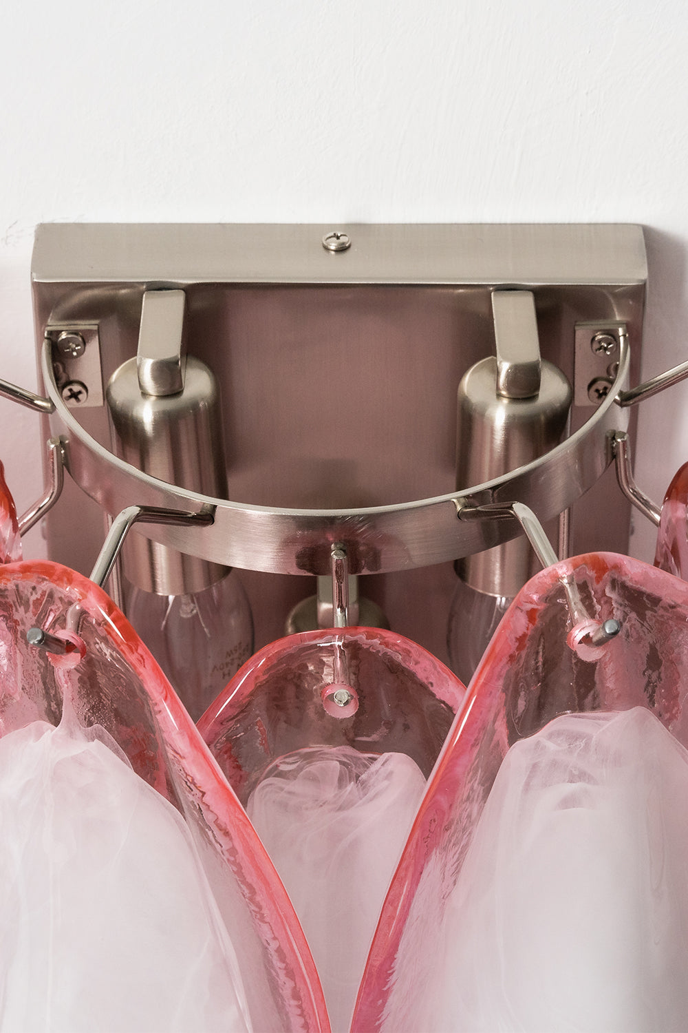 Elysian Bloom Glass Wall Lamp | Metal, Glass | Close-up of the internal chrome metal frame, sockets, and mounting plate | Detail shot | Samu Lamp