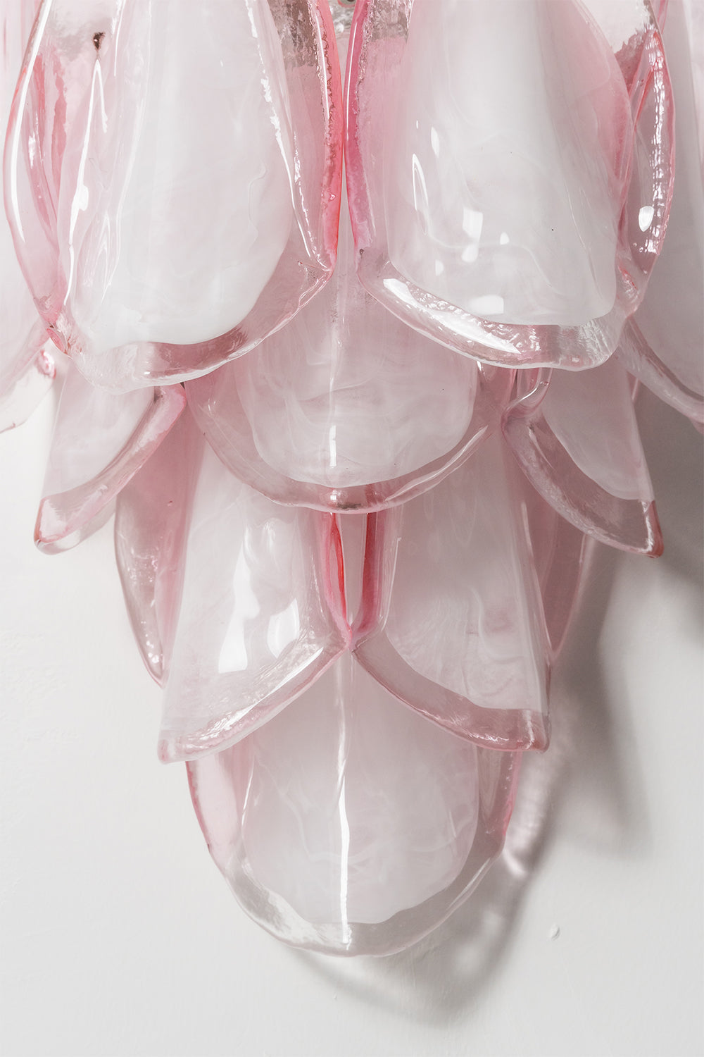 Elysian Bloom Glass Wall Lamp | Metal, Glass | Close-up focus on the tiered cascading tips of the pink glass petals | Detail shot | Samu Lamp