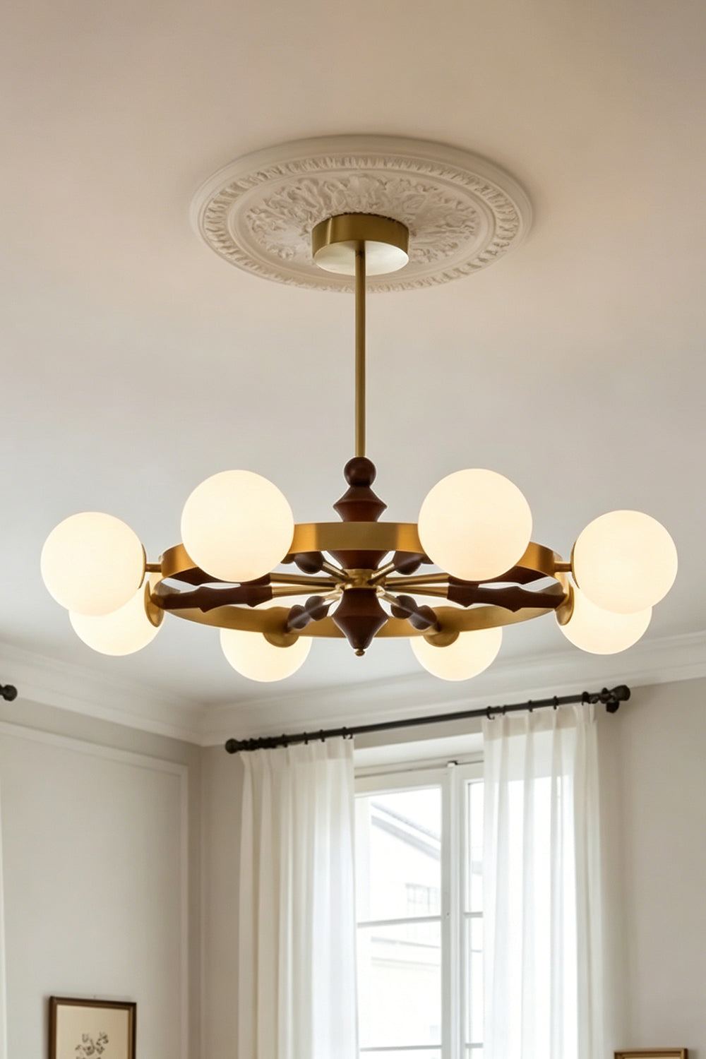 Elysian Circlet Chandelier with white globes on a decorated ceiling | Metal, Glass, Wood | Traditional interior scene with warm lighting | Samu Lamp