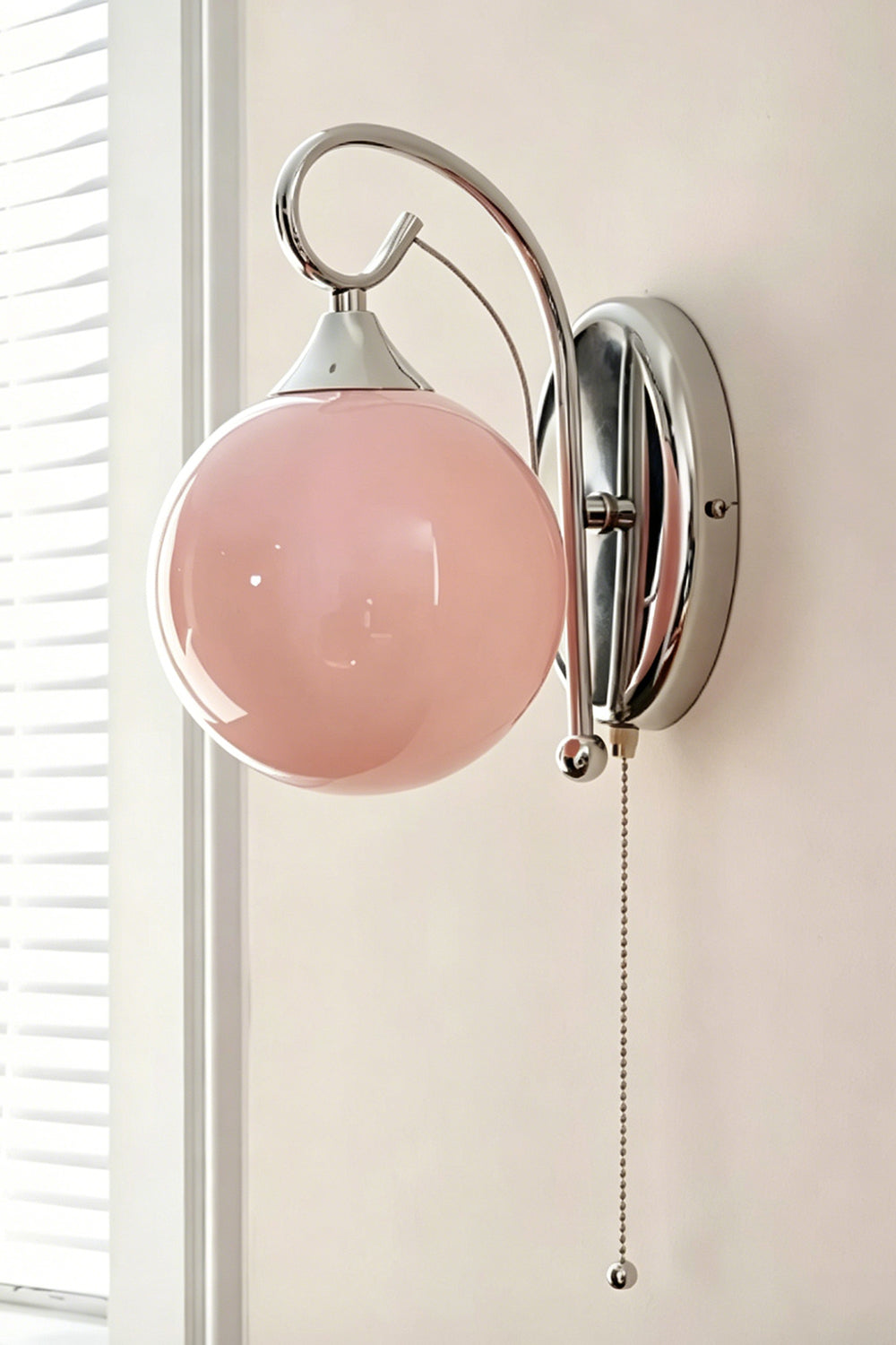 Elysian Circlet with pink globe | Metal, Glass | Light wall near window installation | Samu Lamp