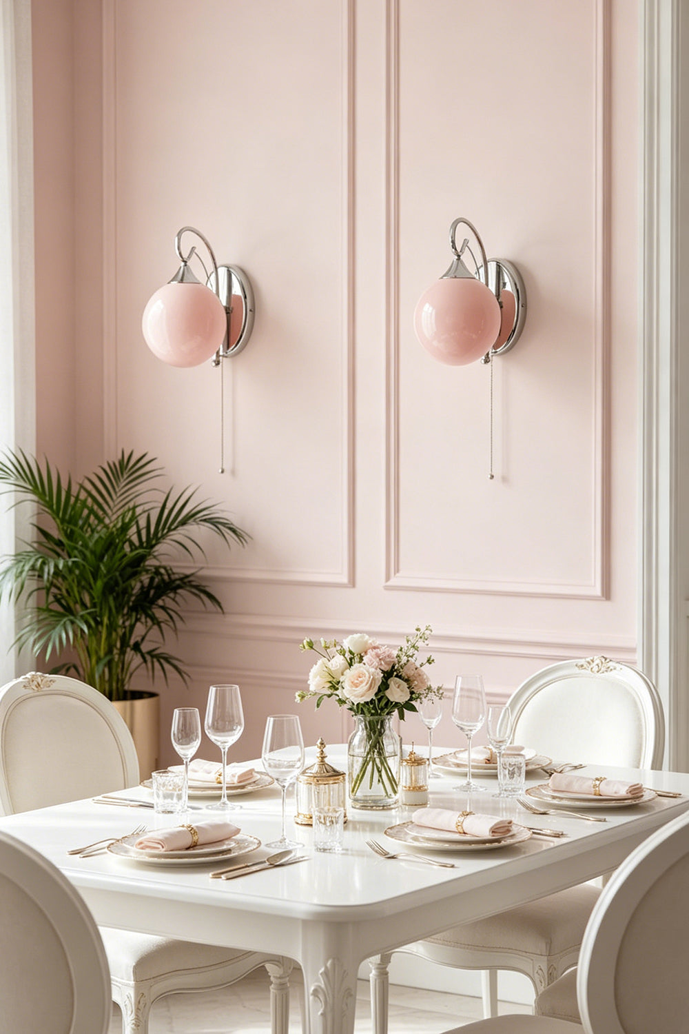Pair of pink globe wall sconces | Metal, Glass | Sophisticated dining room with paneled pink walls | Samu Lamp