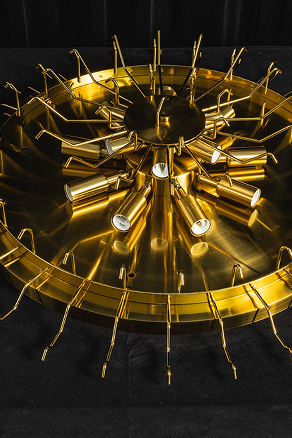 Elysian Tiered Fluted Ceiling Light | Glass, Metal | Macro close-up view of the empty polished gold circular ceiling mount pan frame with multiple light bulb sockets | Detail shot | Samu Lamp
