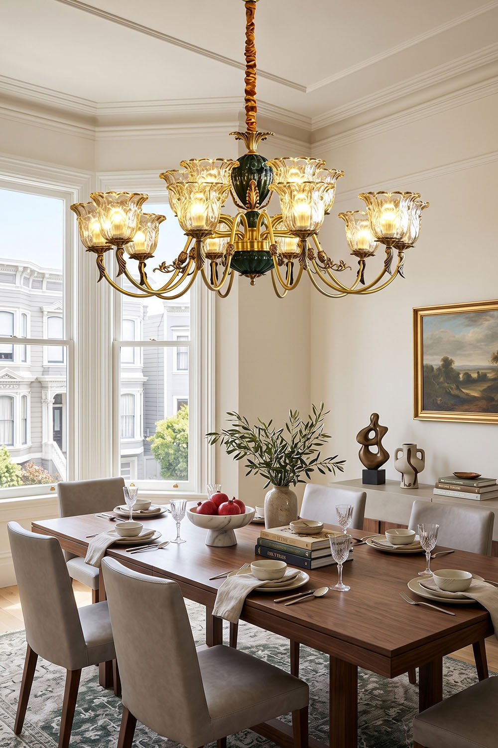 Emeric Green Porcelain and Brass Chandelier illuminating a dining room with elegant decor.