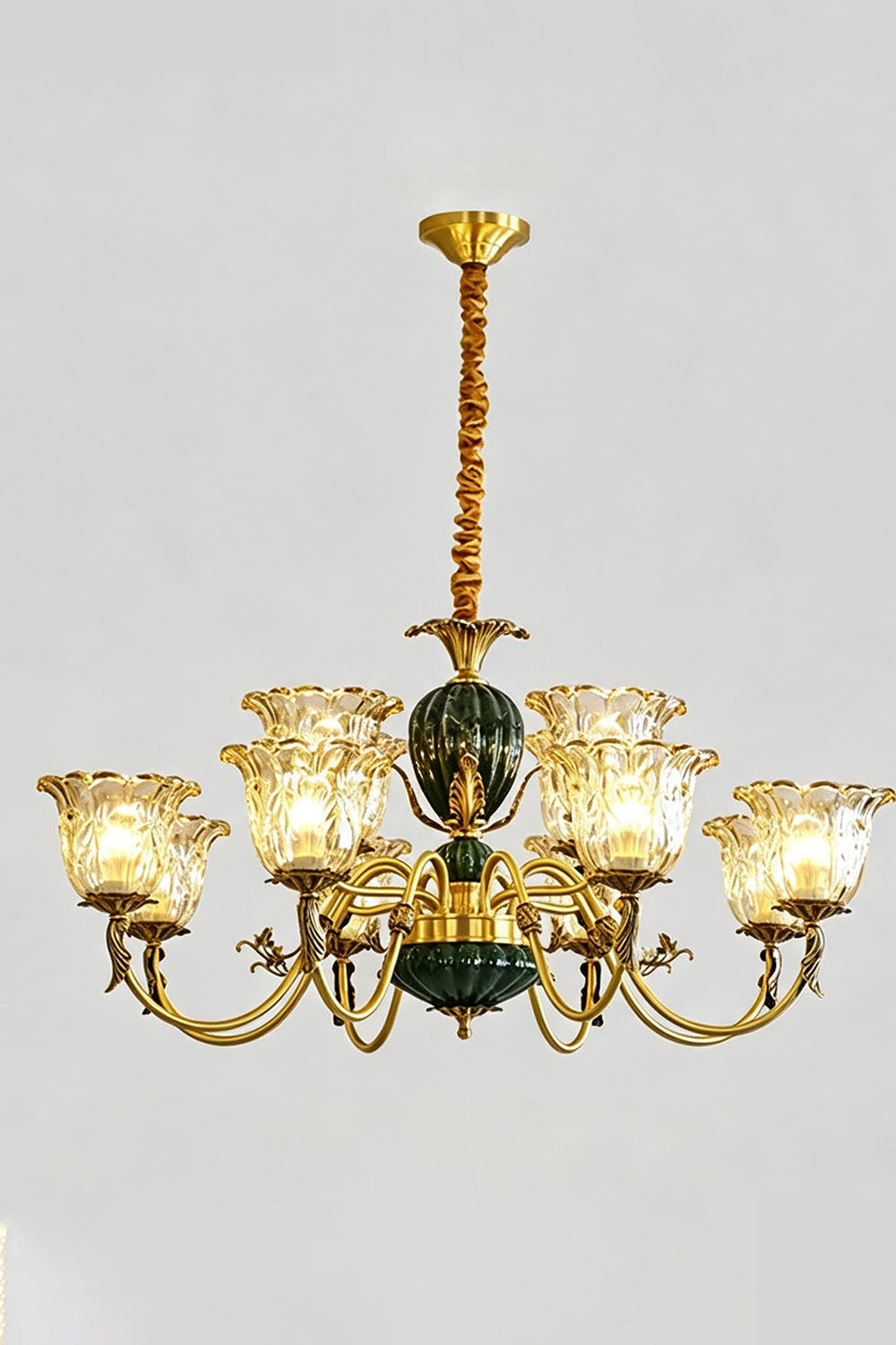 Emeric Green Porcelain and Brass Chandelier featuring ornate glass shades and elegant brass detailing.
