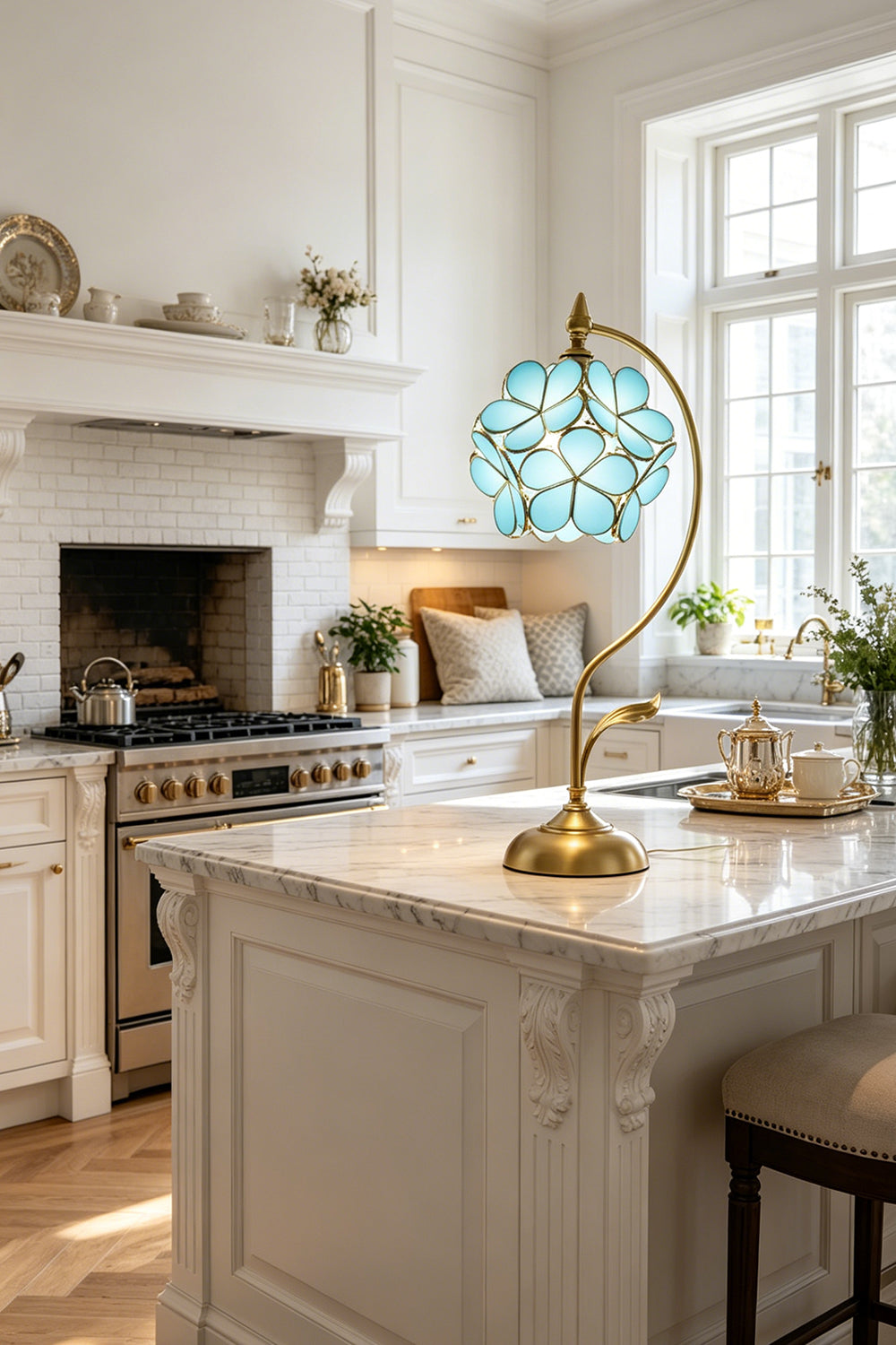 Evanthe Blossom Stained Glass Table Lamp | Stained Glass, Metal | Blue variant standing on a pristine white marble kitchen island counter as elegant statement accent lighting | Samu Lamp