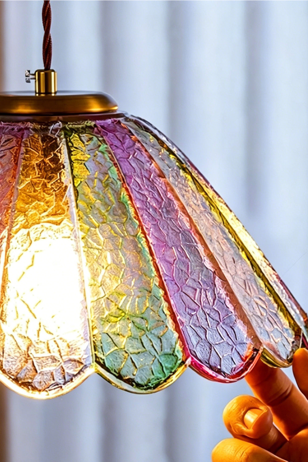 Faye Pastel Scalloped Glass Pendant Lamp | Glass, Metal | Close-up view of the illuminated multi-colored scalloped glass edge showcasing its rich texture | Detail shot | Samu Lamp