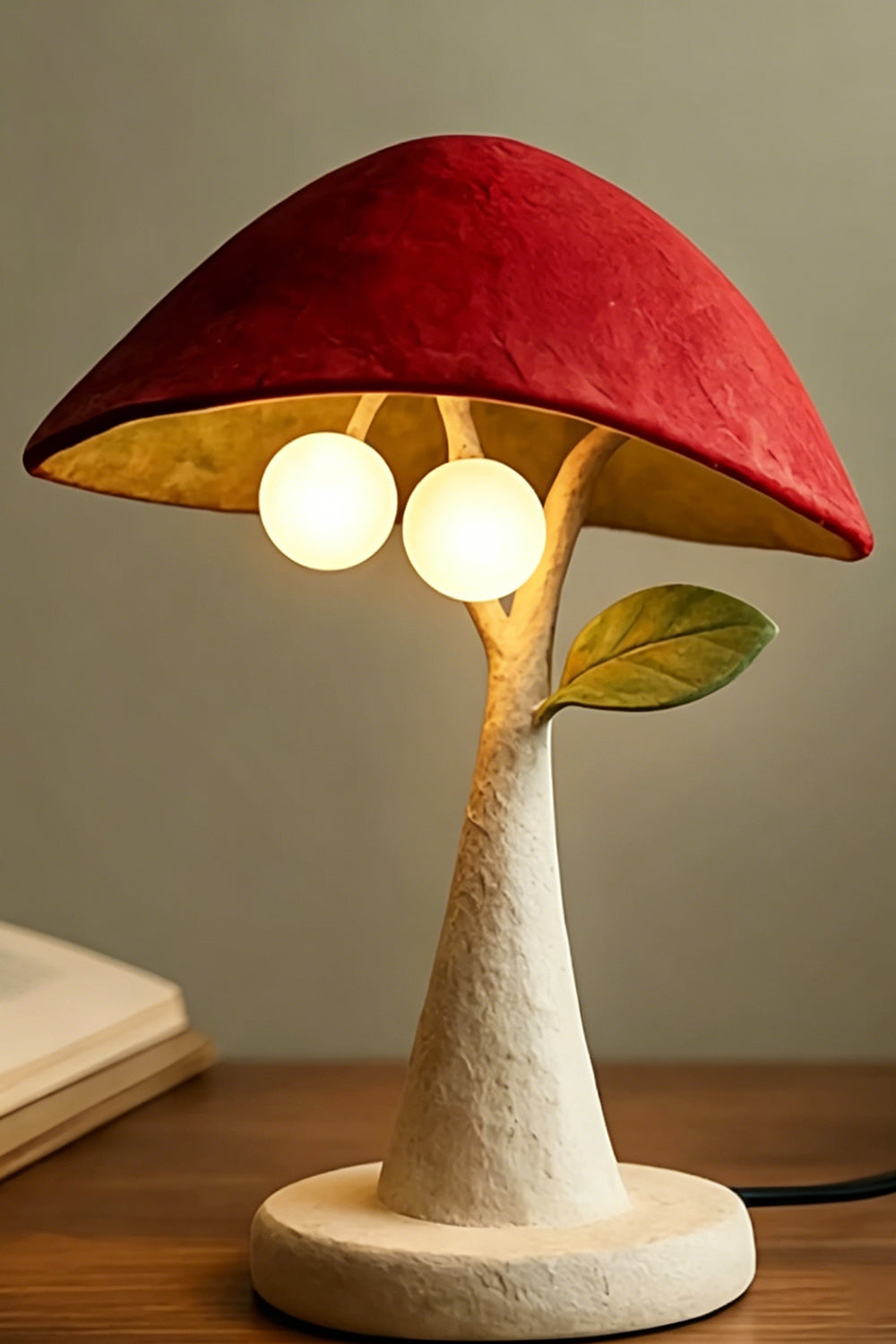 Forest Mushroom lamp red felt variation detail | Metal, Resin | Close-up of lit lamp with red felt cap | Samu Lamp