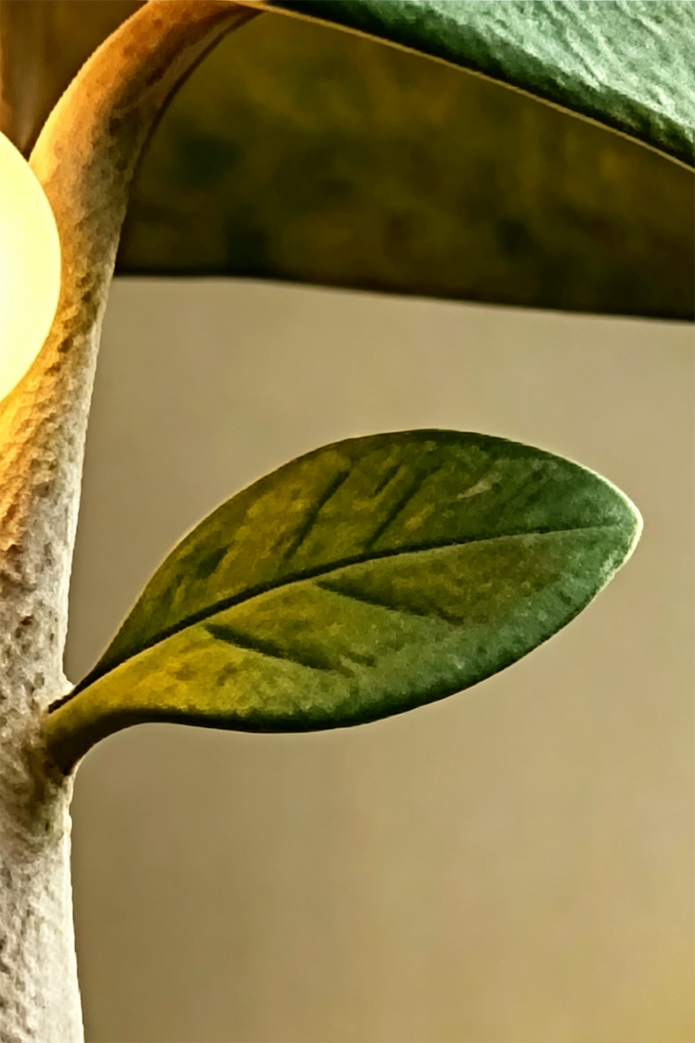 Forest Mushroom lamp leaf and bulb detail | Metal, Resin | Close-up of resin leaf and lit bulb | Samu Lamp