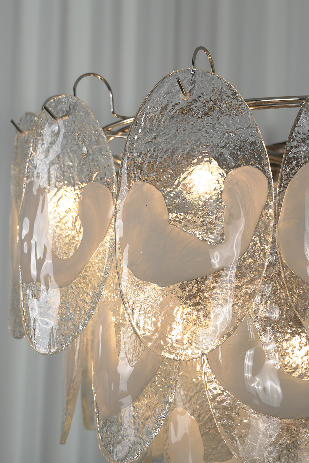 Functional detail of lit glass panels and metal hooks | Metal, Glass | Close-up of internal lighting and hardware | Samu Lamp