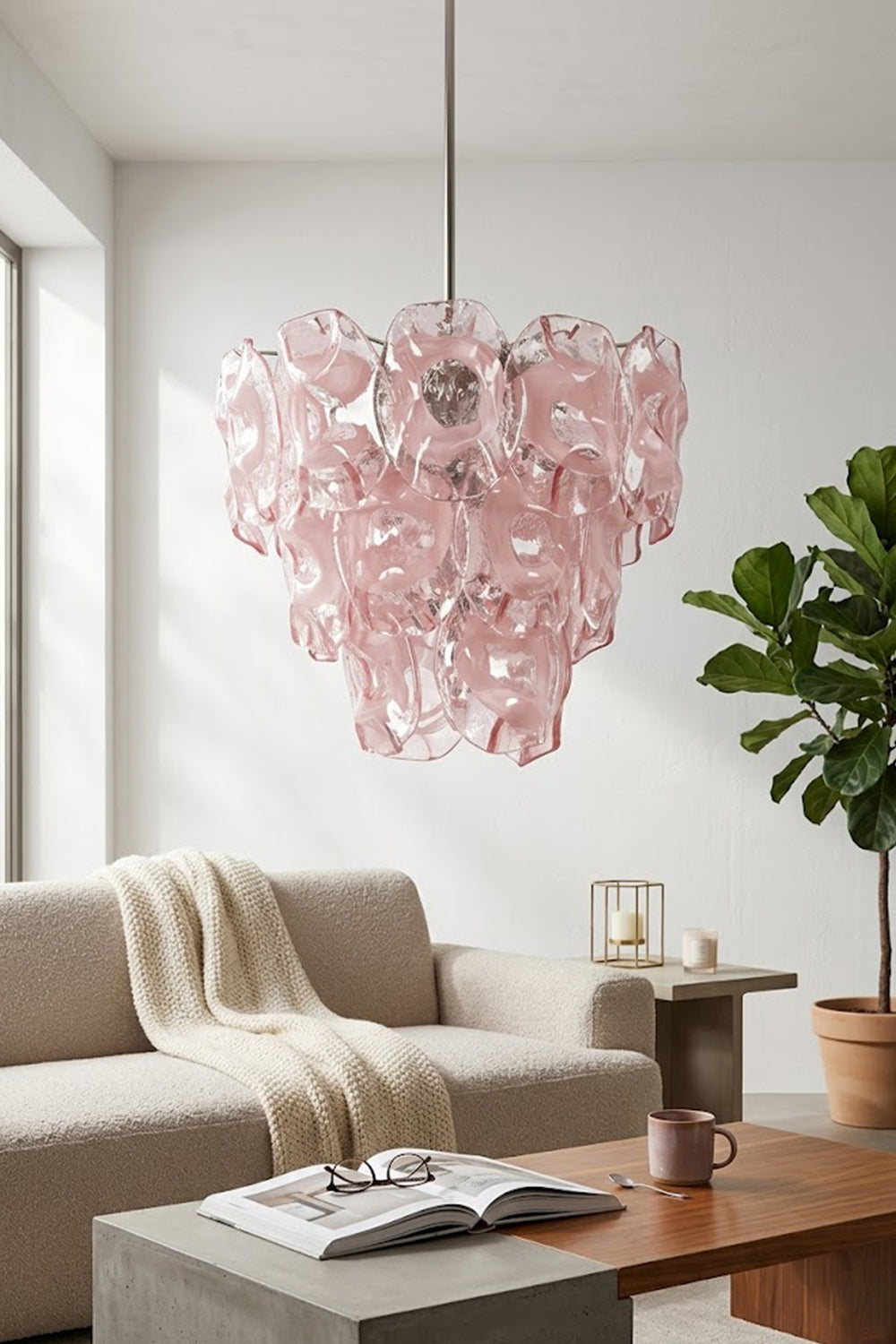 Tiered pink glass pendant light | Metal, Glass | Hanging in a bright living room over beige sofa | Samu Lamp