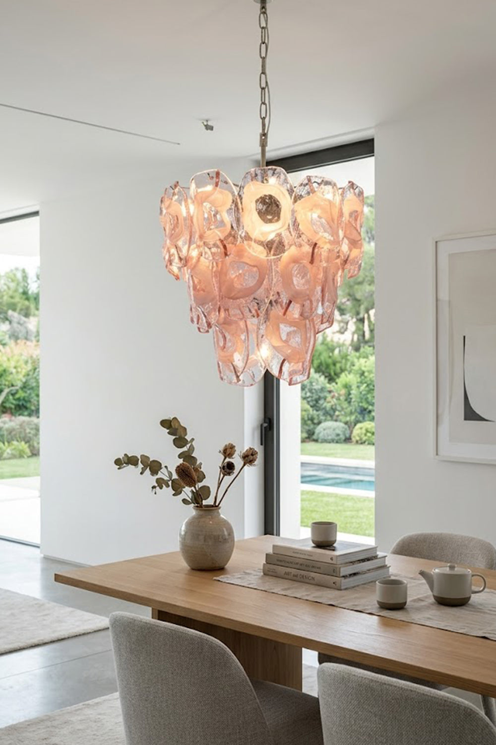 Frostelle pink glass chandelier | Metal, Glass | Over a wooden dining table in a bright room | Samu Lamp