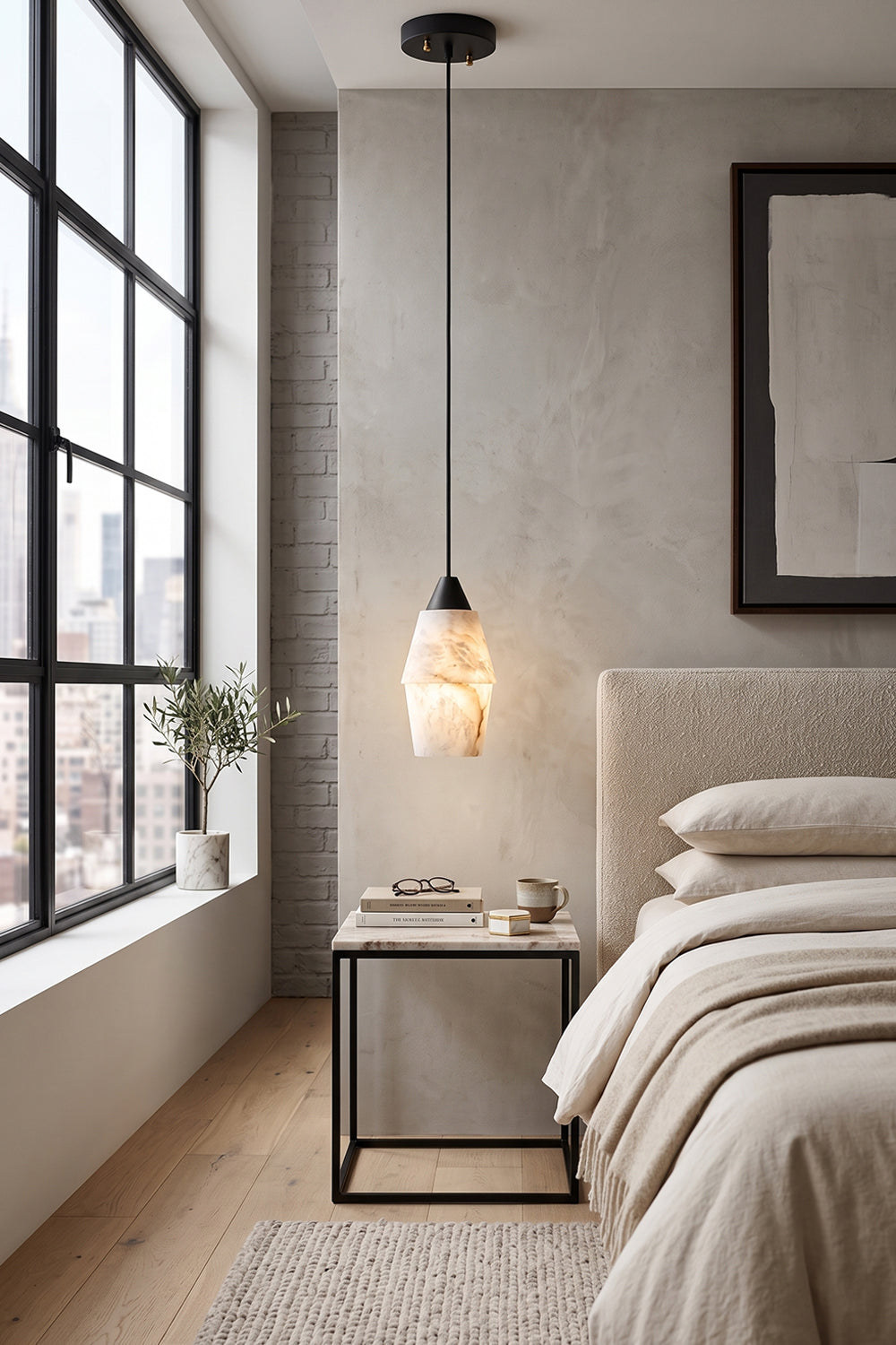 Gemma Staggered Alabaster Cluster Chandelier | Bedside Pendant Light | Single light variant hanging beautifully as a warm bedside reading light next to a cream upholstered bed | Samu Lamp