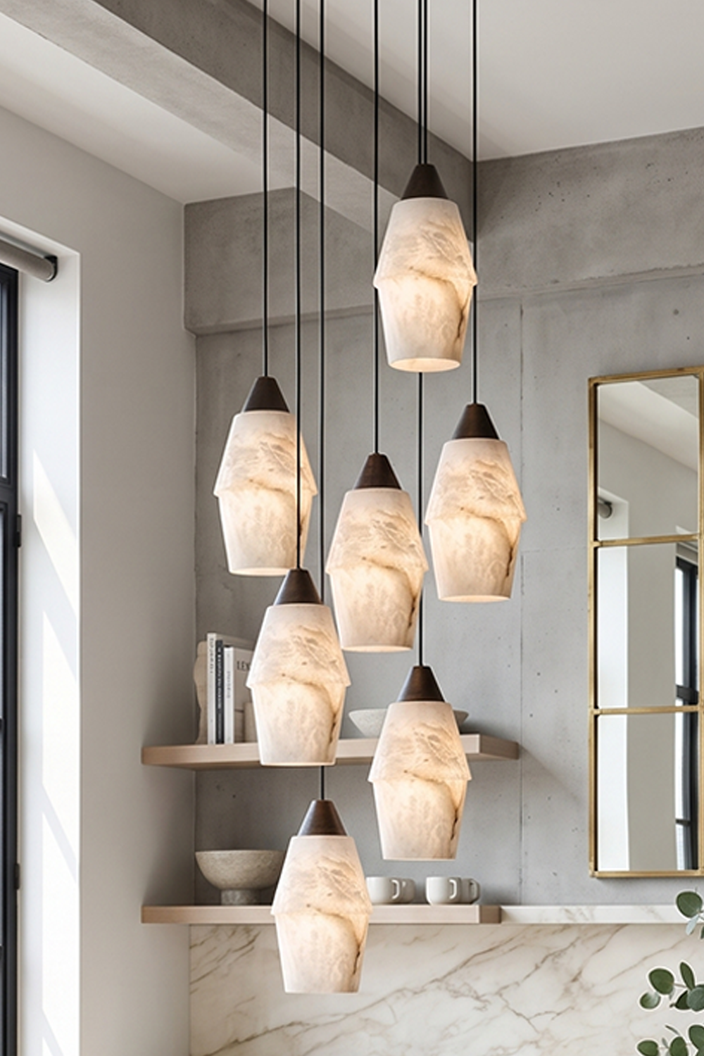 Gemma Staggered Alabaster Cluster Chandelier | Staggered Cluster Detail | Closer shot focusing on the group of glowing organic rock-like stone pendant shades casting a rich golden halo | Samu Lamp