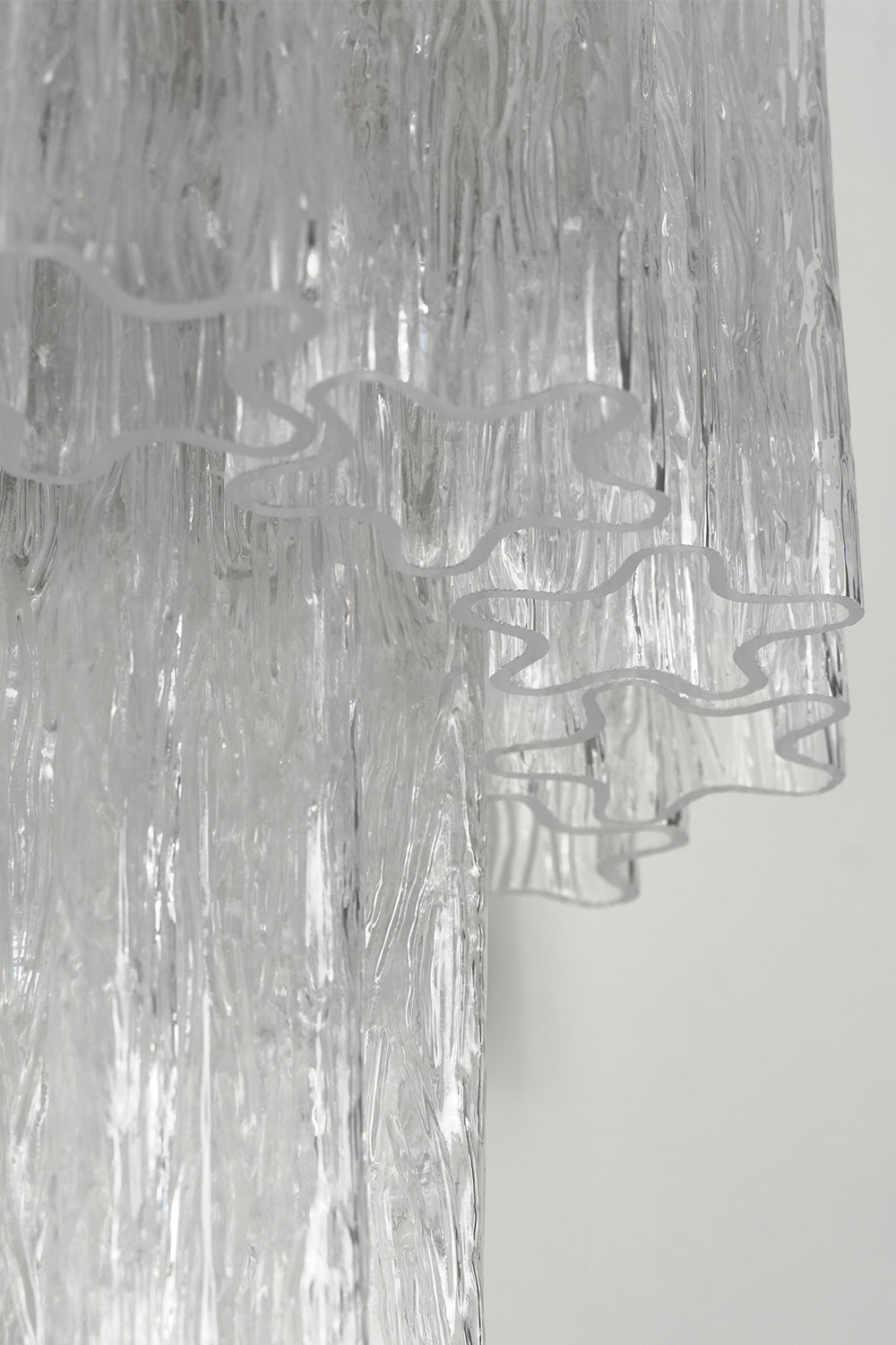 Close-up of glacier glass texture on wall light | Glass | Detail shot of ice-like textured glass | Samu Lamp