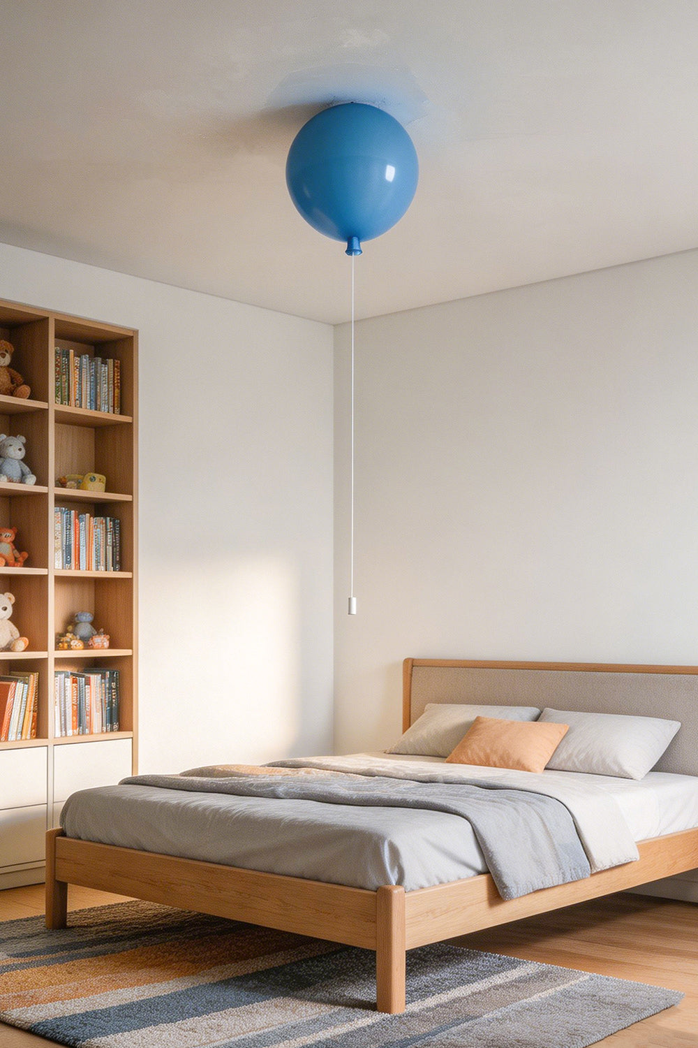 Glass Balloon Ceiling Light illuminating a modern bedroom with a blue balloon design.