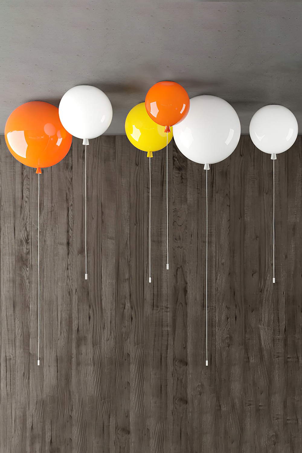 Colorful Glass Balloon Ceiling Light fixtures suspended from a ceiling, showcasing a playful design.
